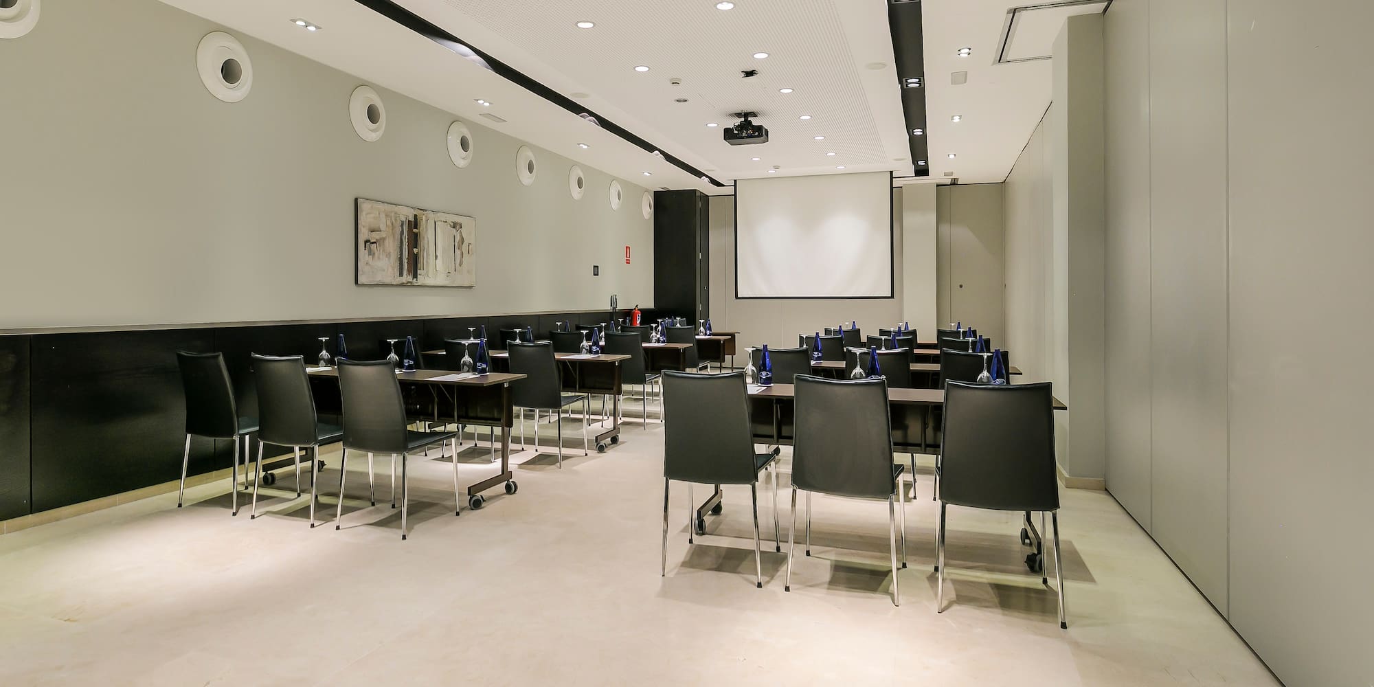 a room with tables and chairs