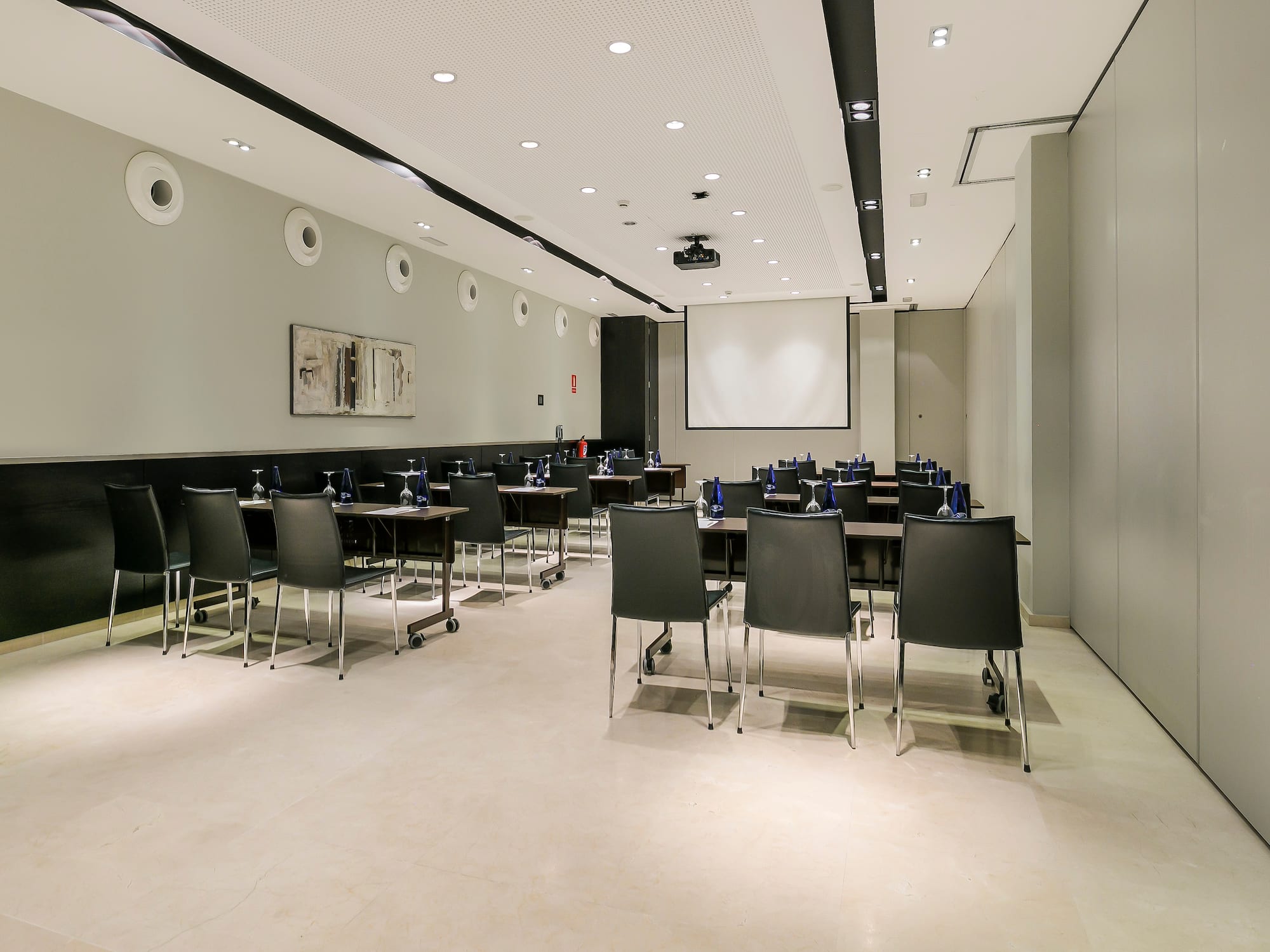 a room with tables and chairs