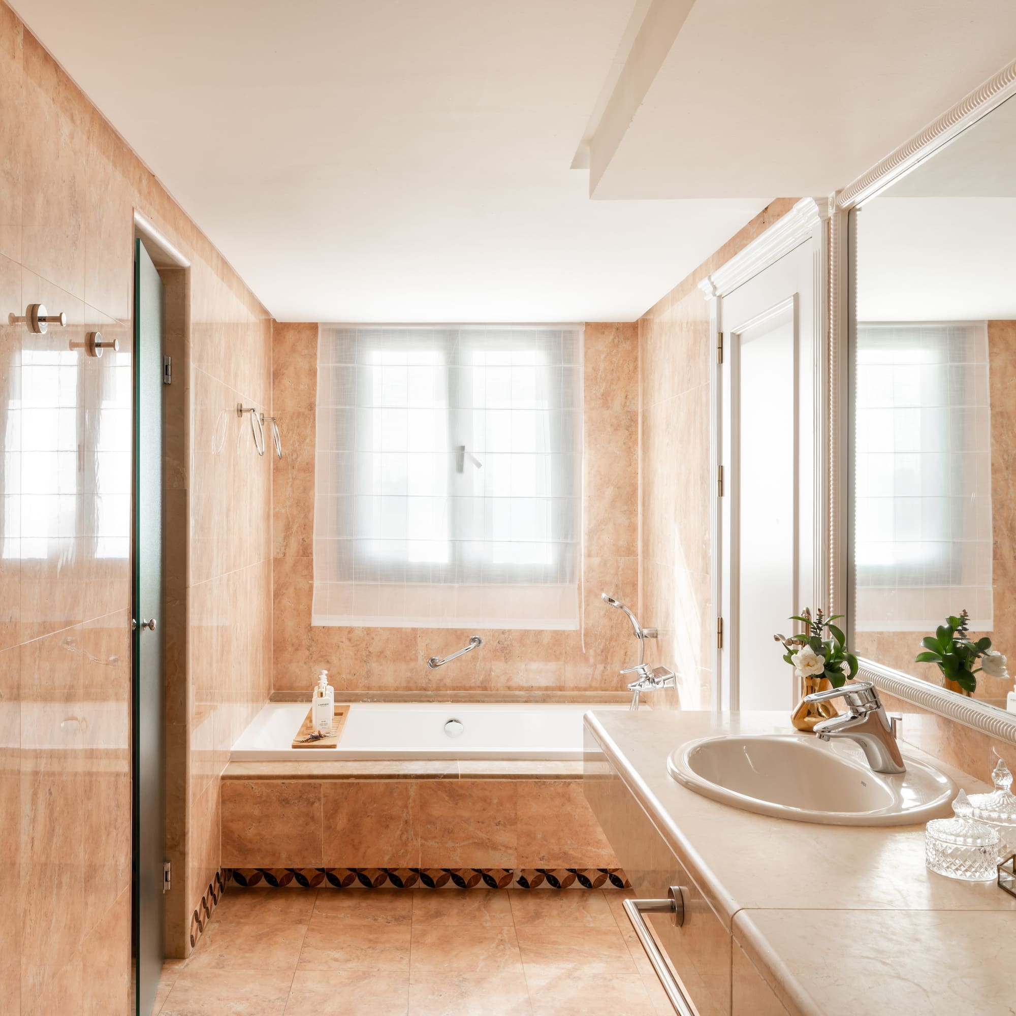 a bathroom with a sink and bathtub