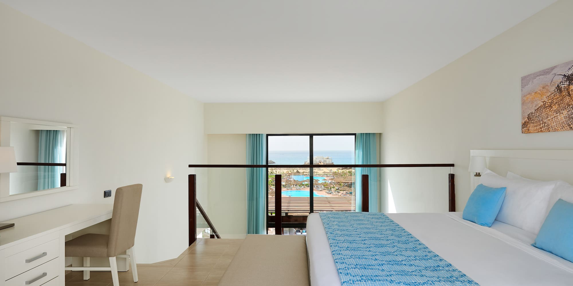 a bedroom with a bed and a table