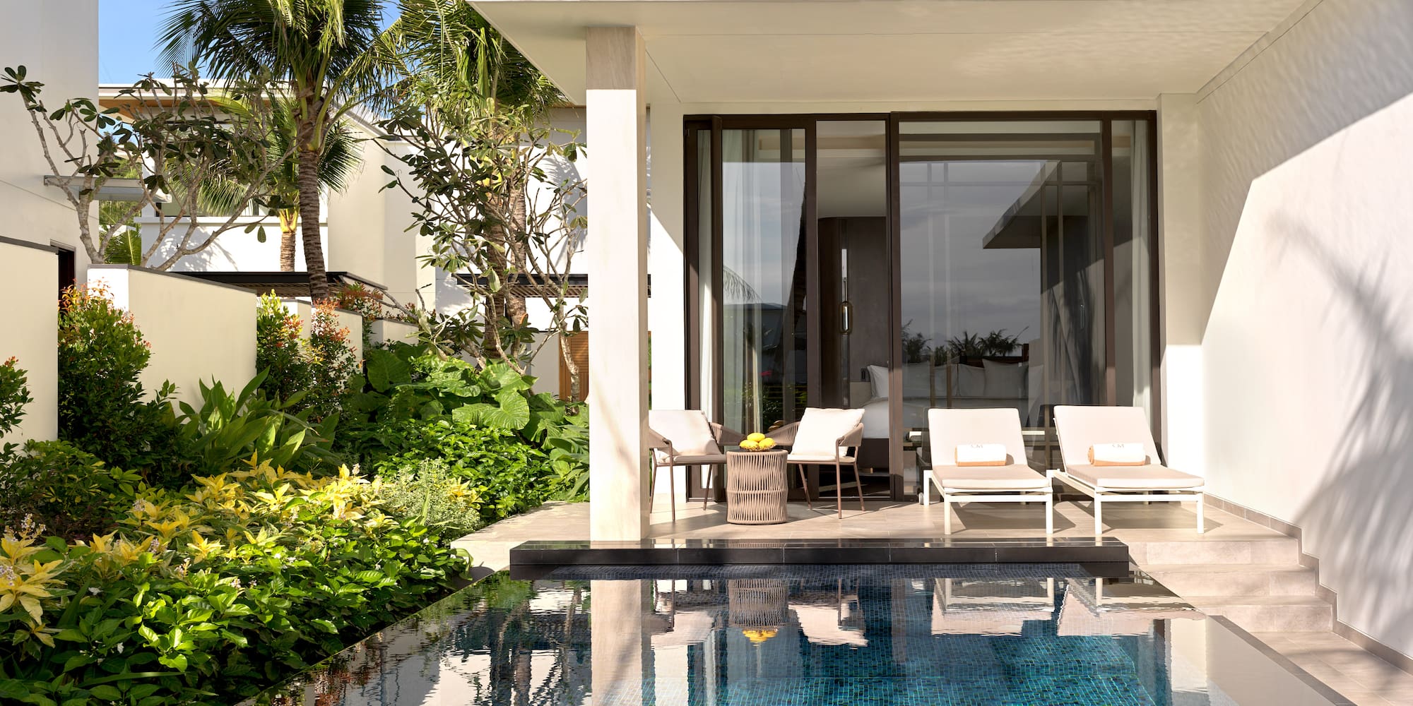 a pool in front of a house