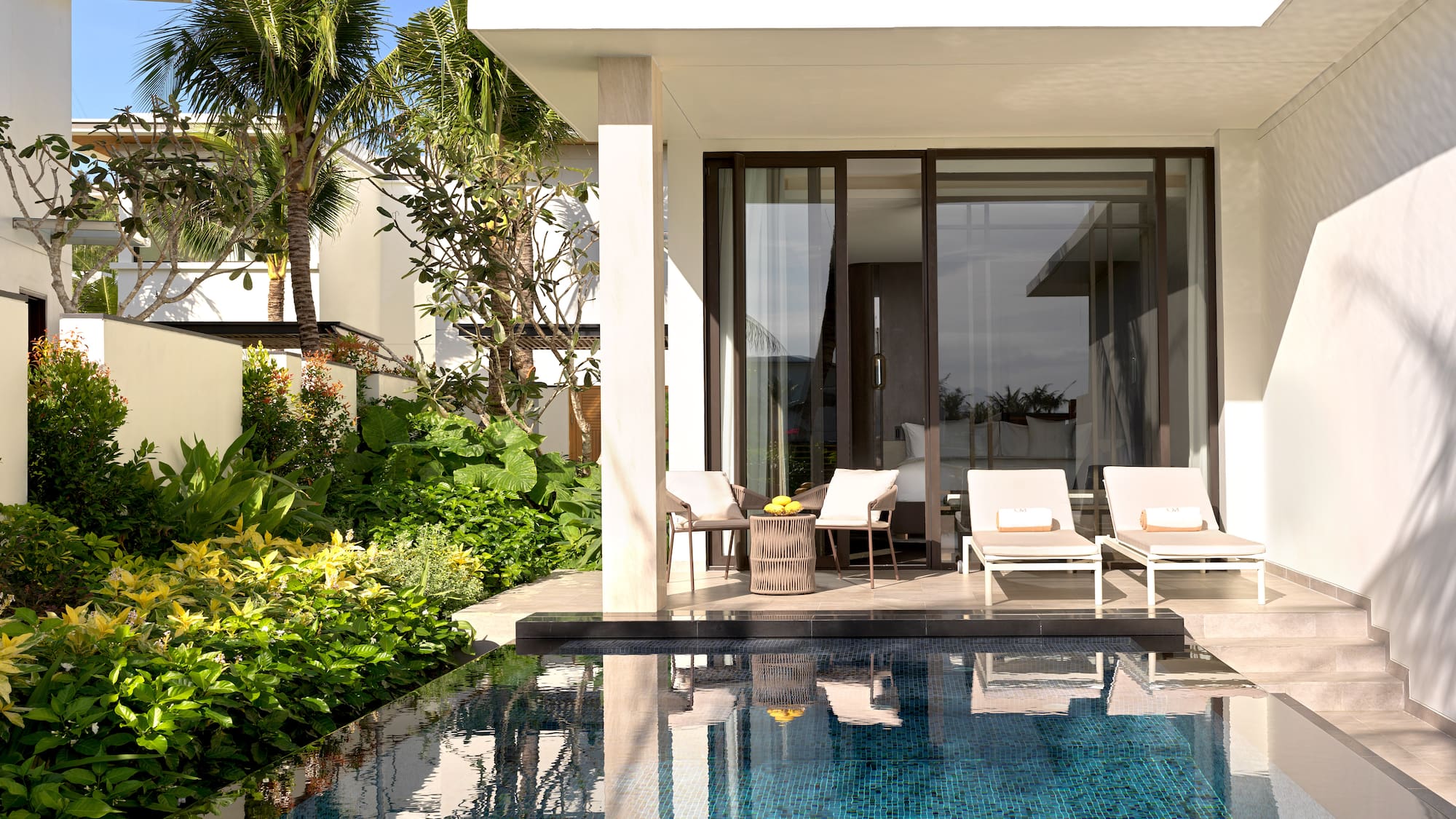a pool in front of a house