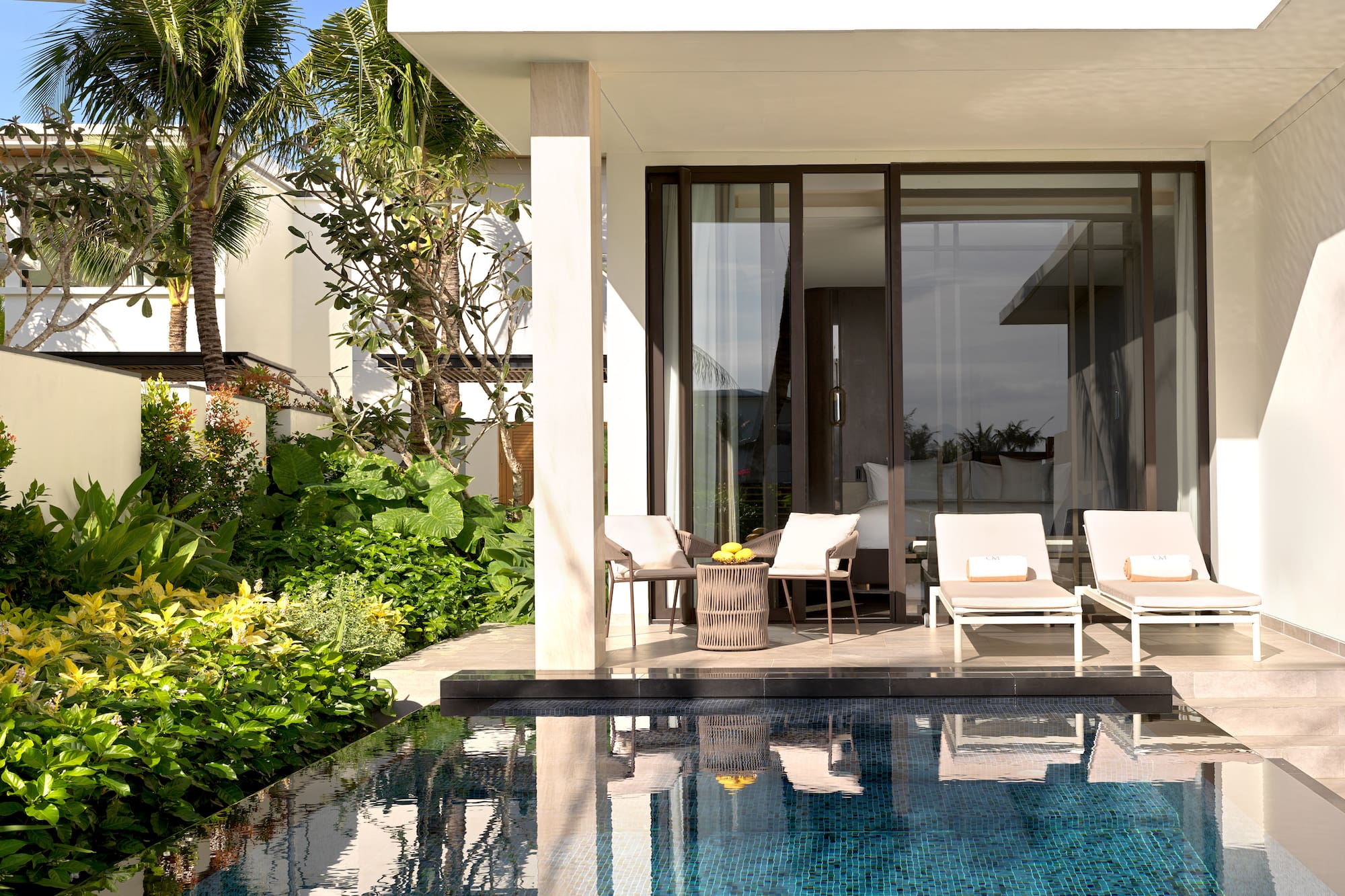 a pool in front of a house