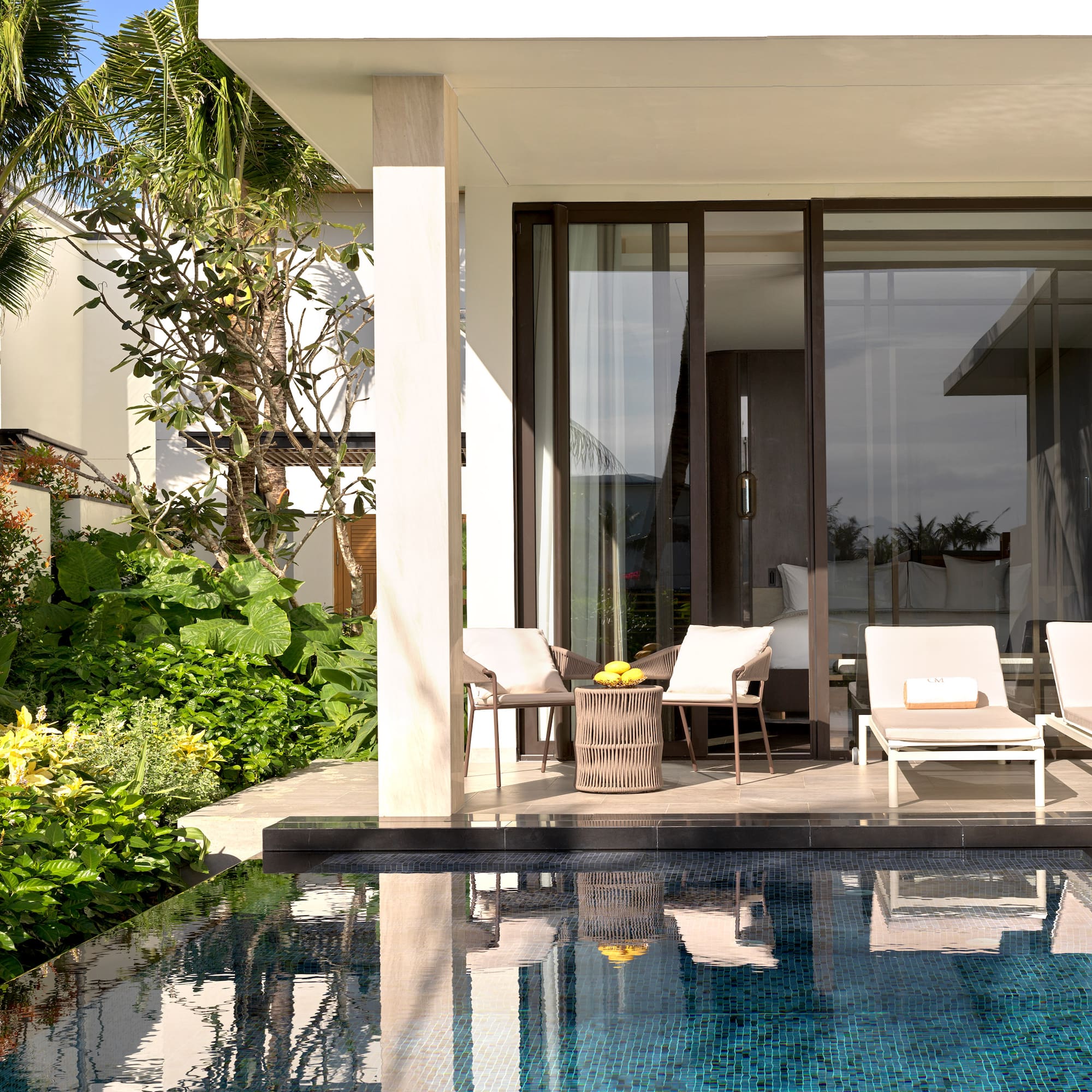 a pool in front of a house