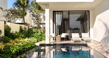 a pool in front of a house