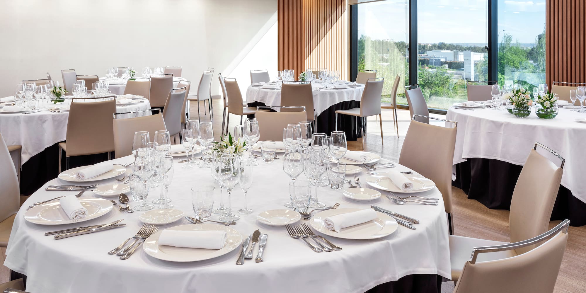 a room with tables and chairs