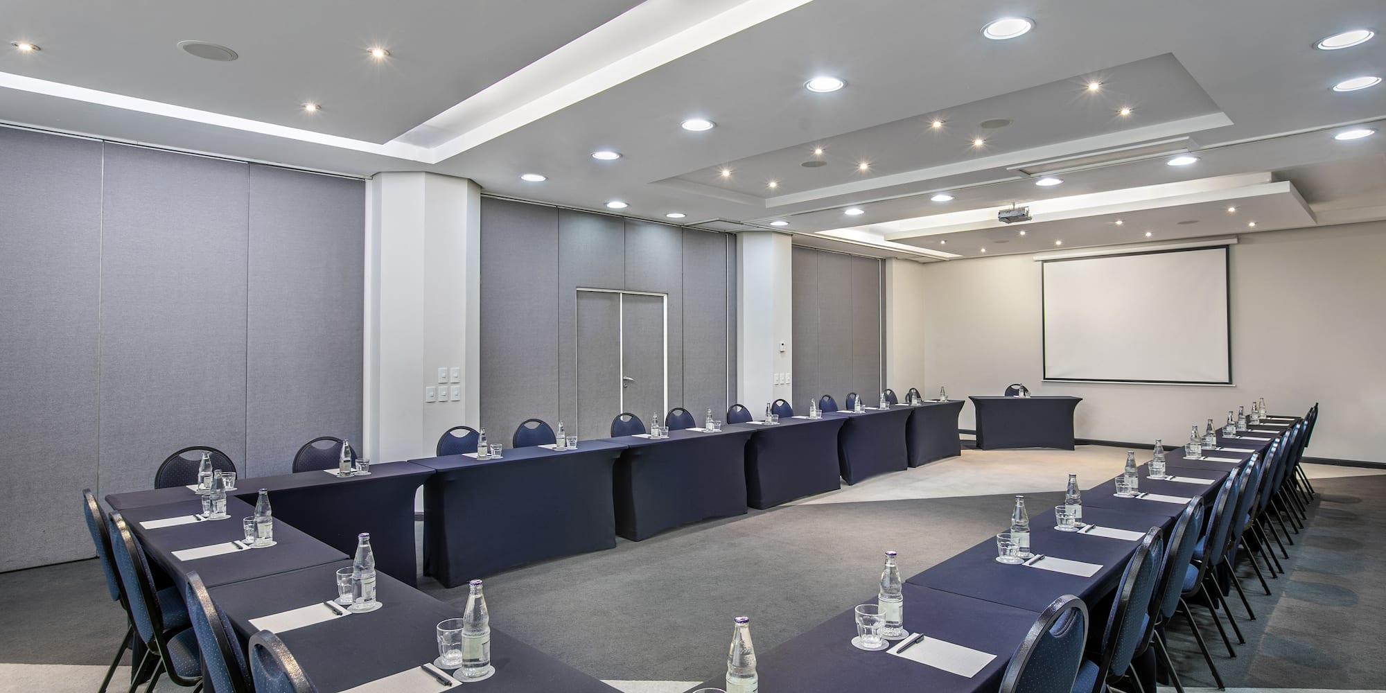 a room with tables and chairs