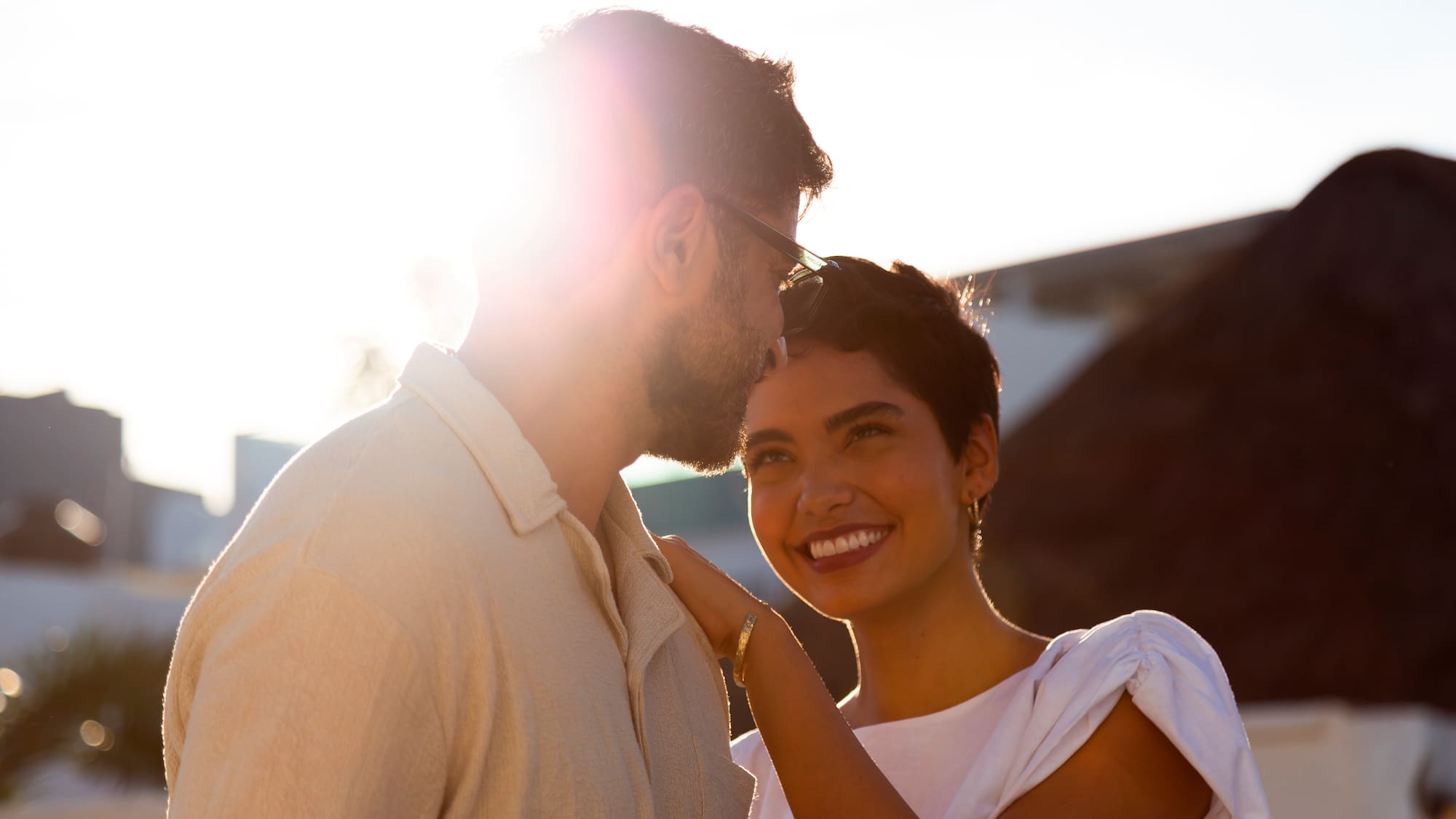 a man and woman smiling