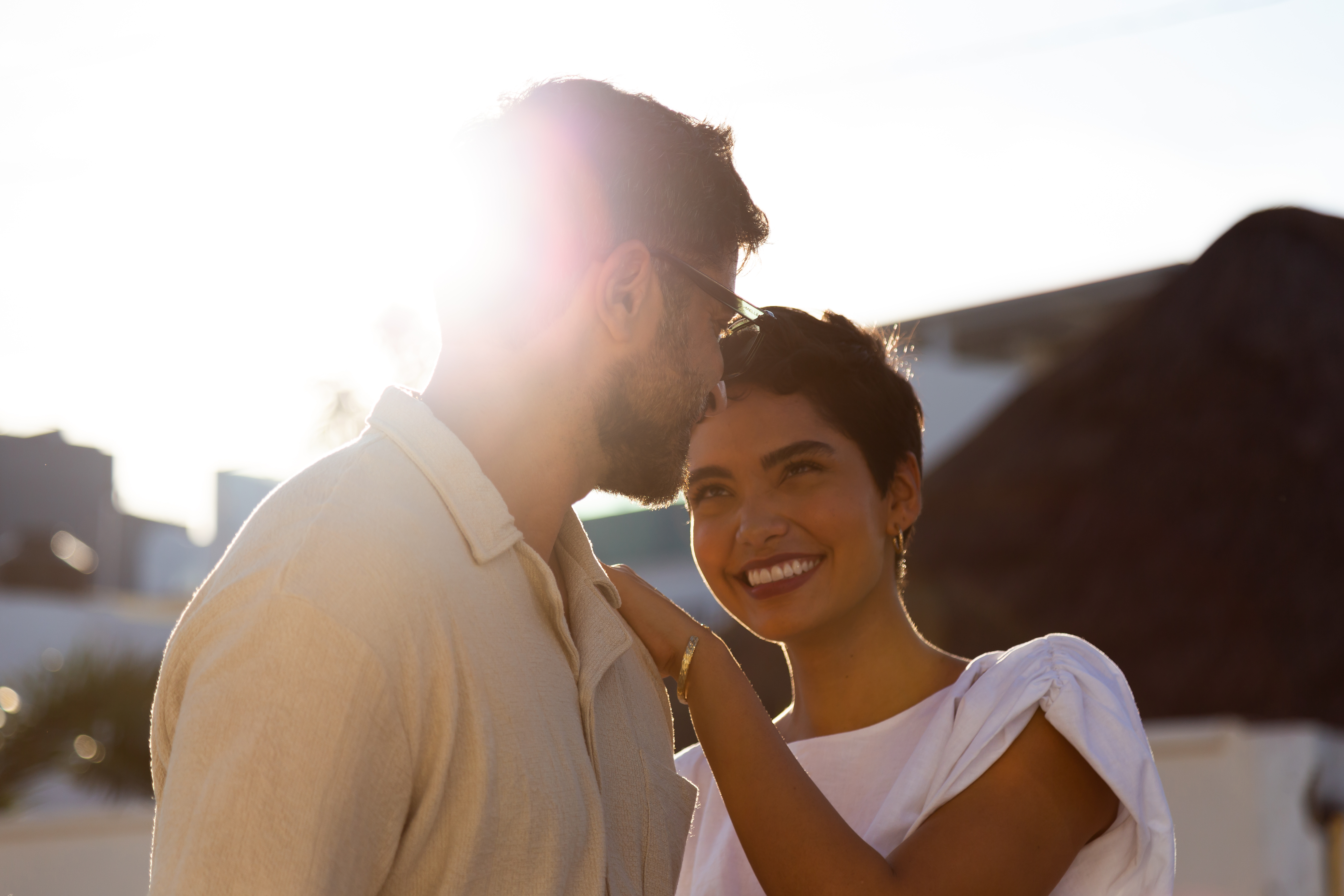 a man and woman smiling