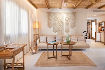 a living room with a couch and table