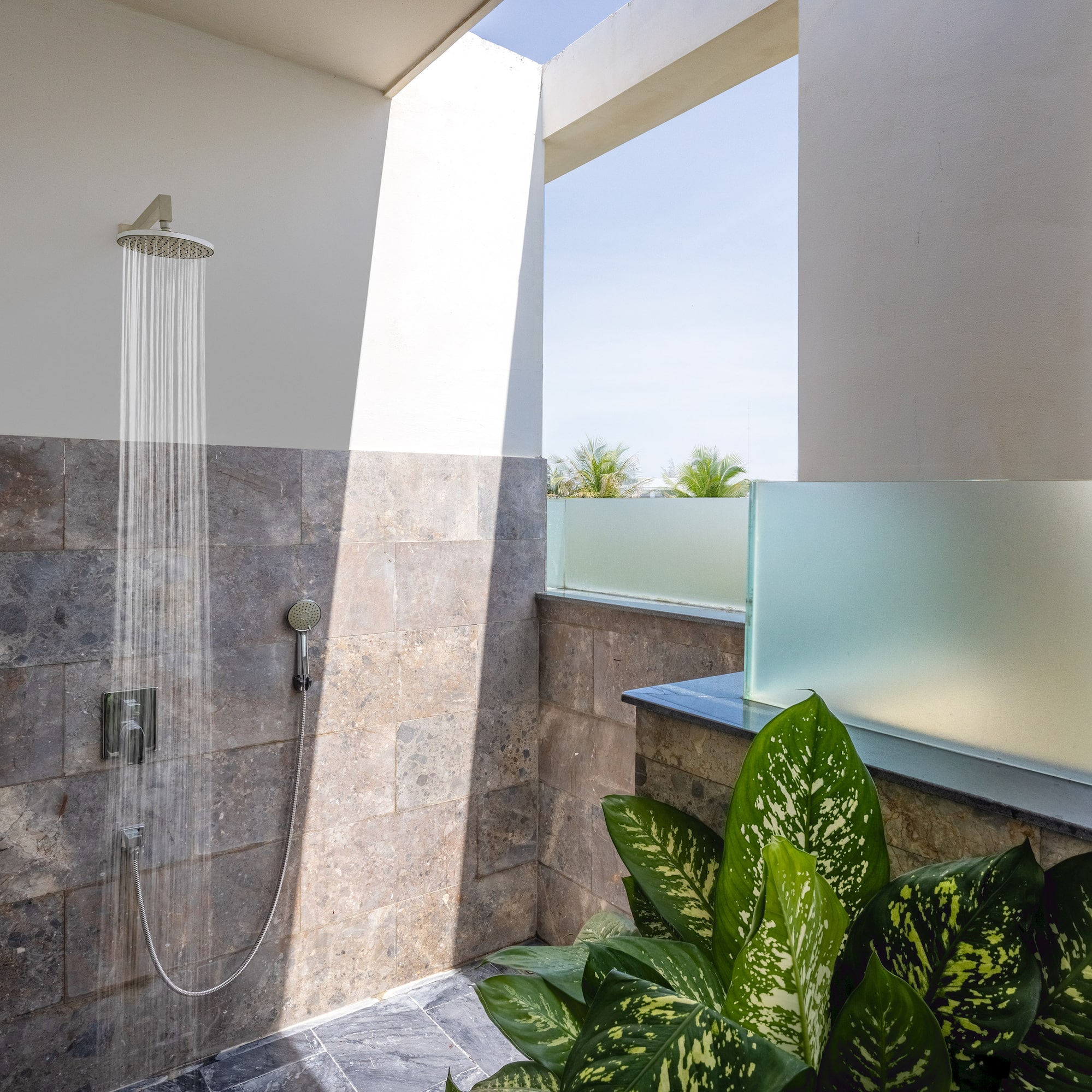 a shower with water running out of it