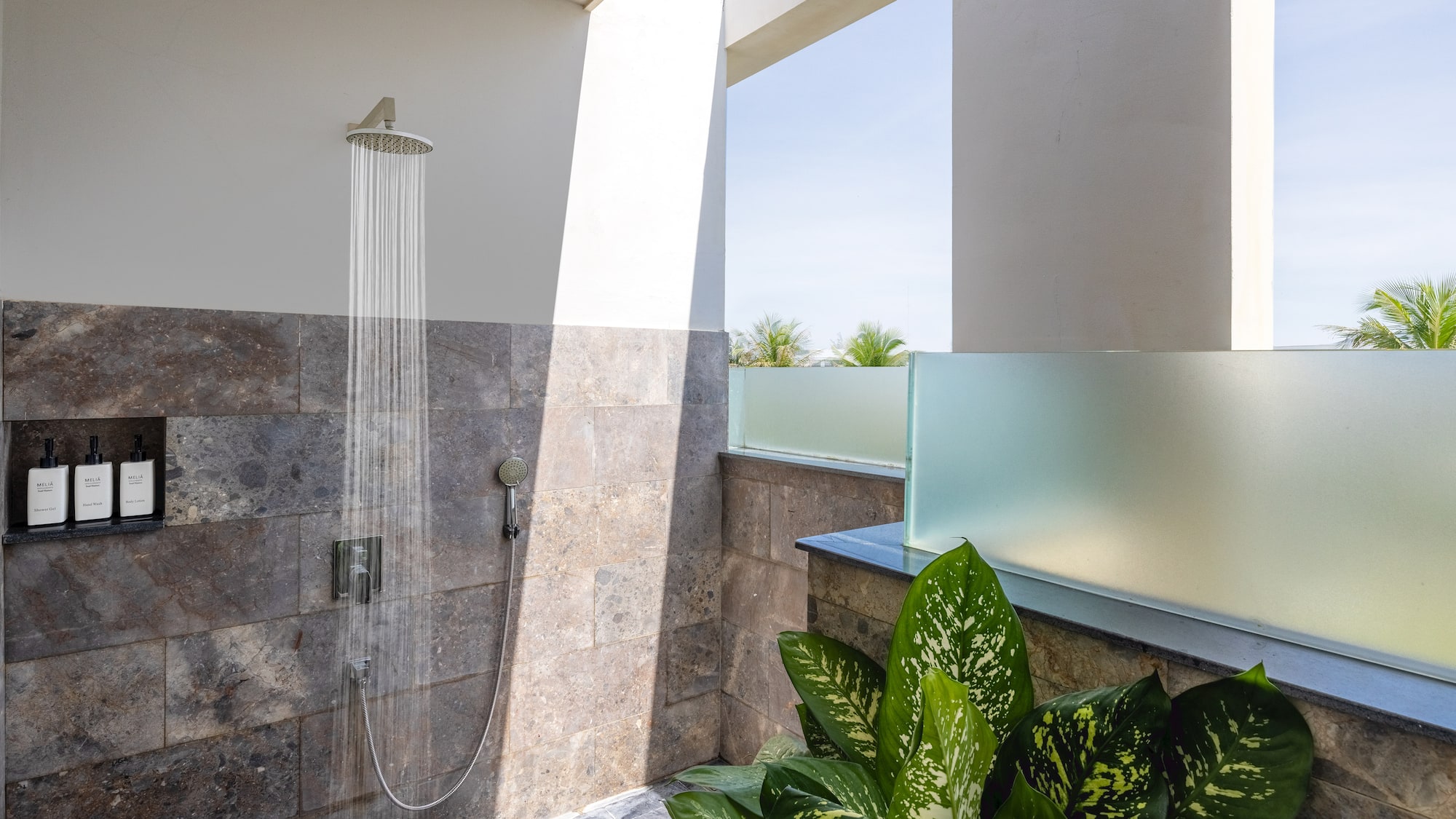 a shower with water running out of it