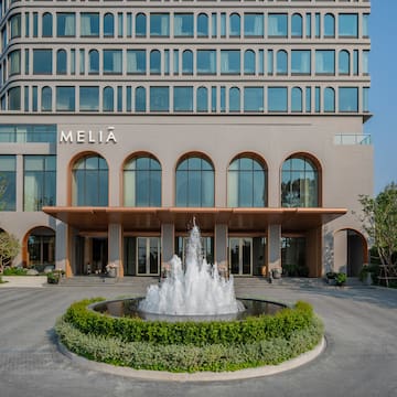 a fountain in front of a building