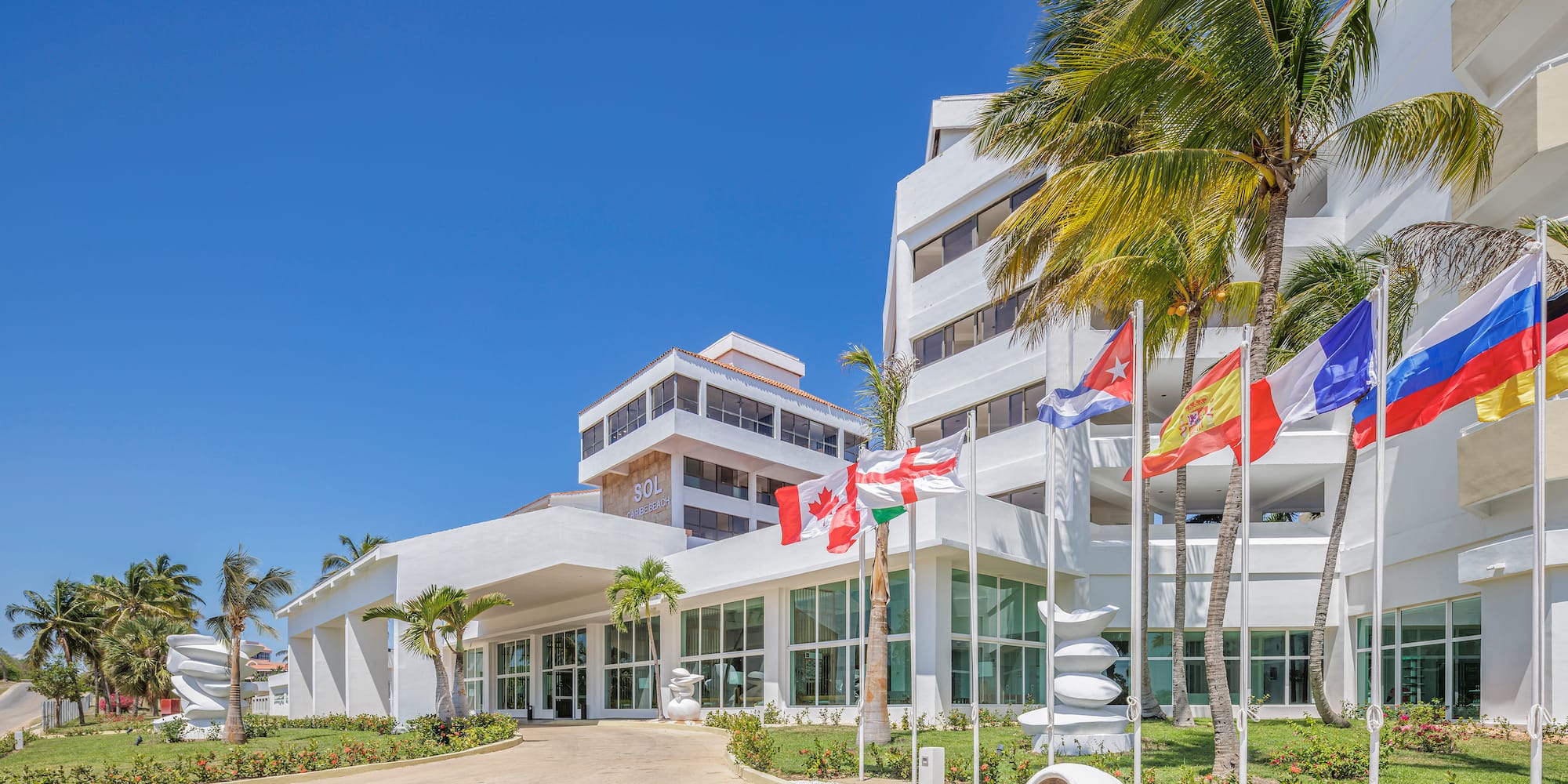 a building with flags in front of it