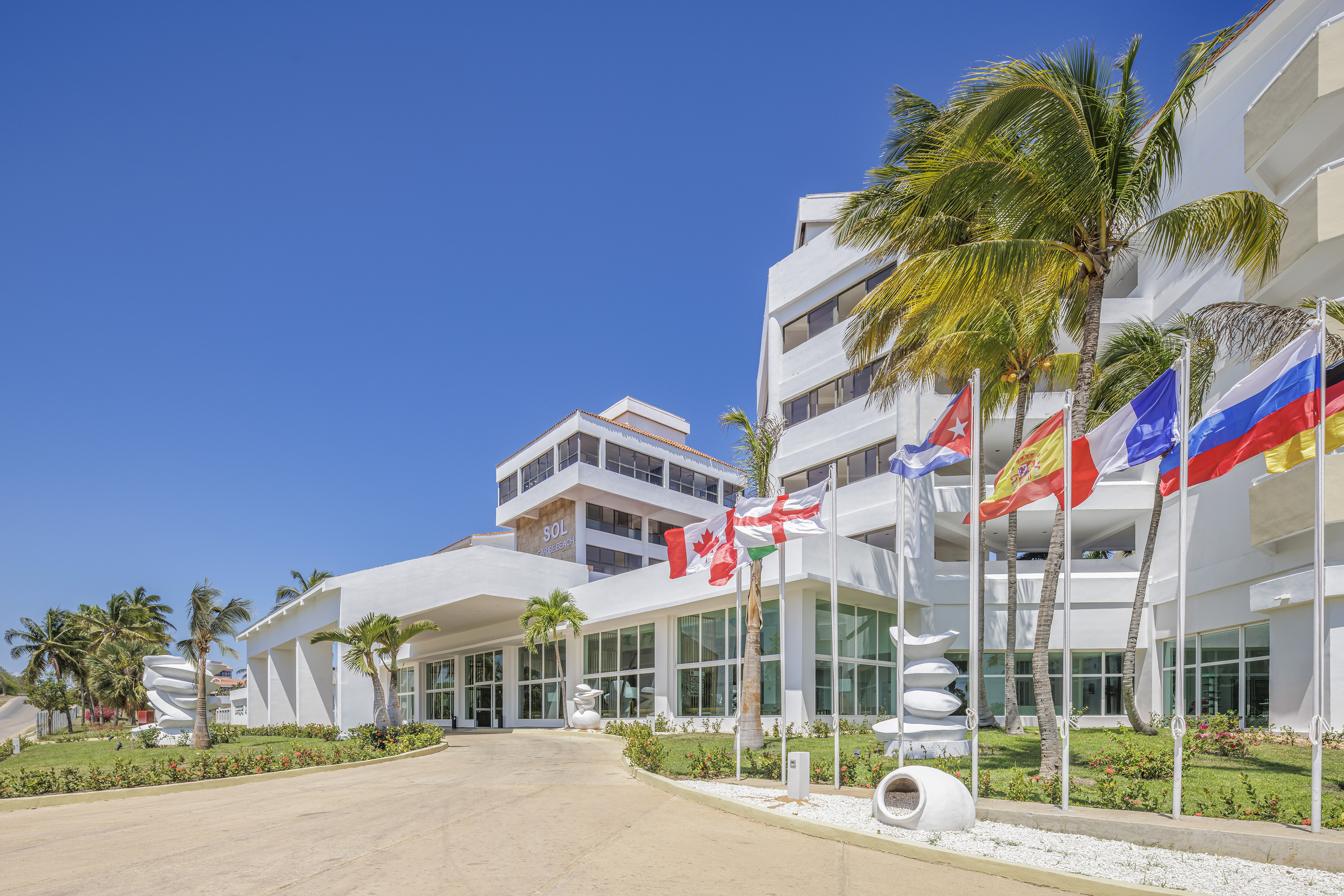 a building with flags in front of it