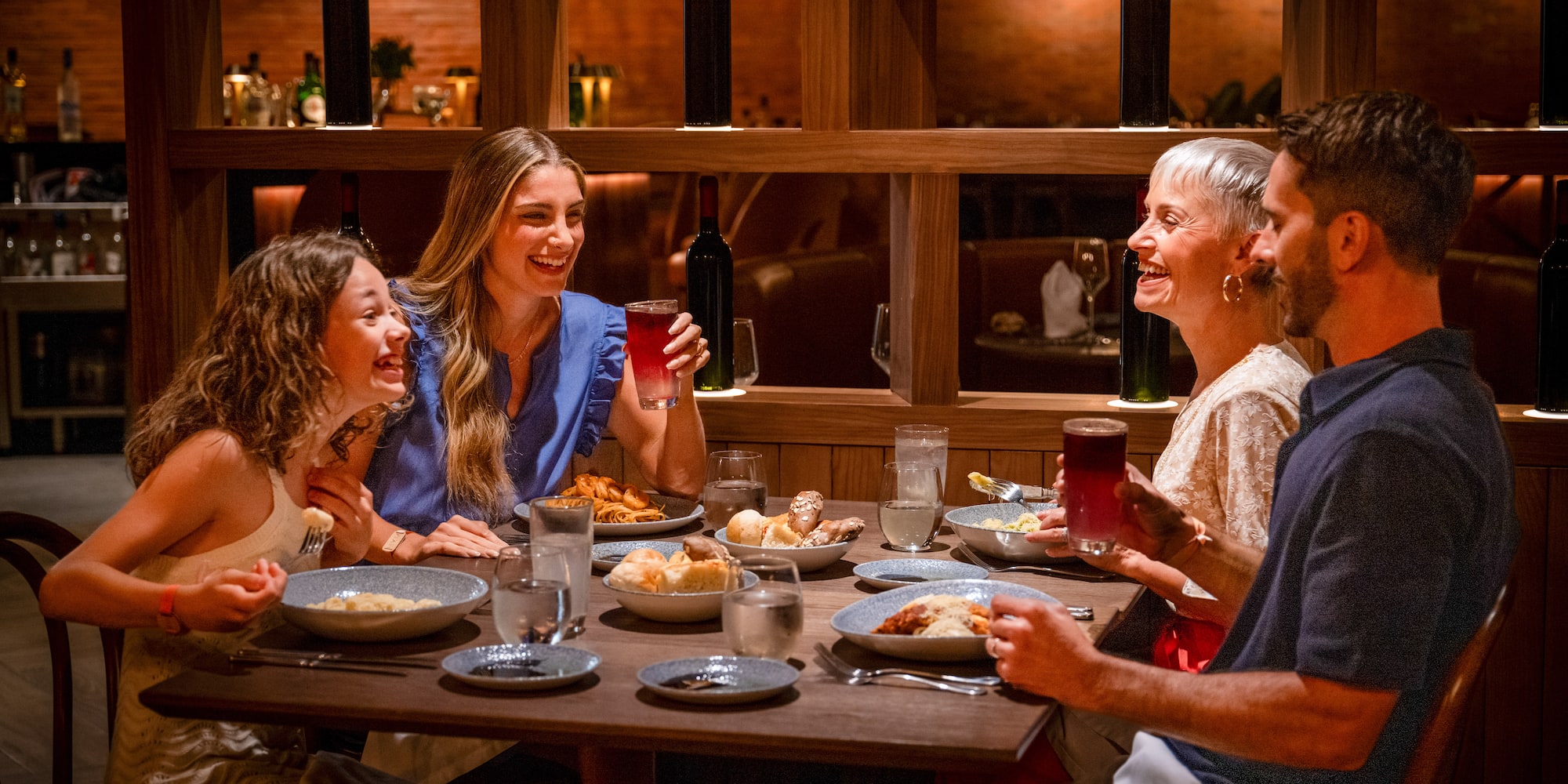 a group of people sitting at a table