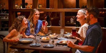 a group of people sitting at a table