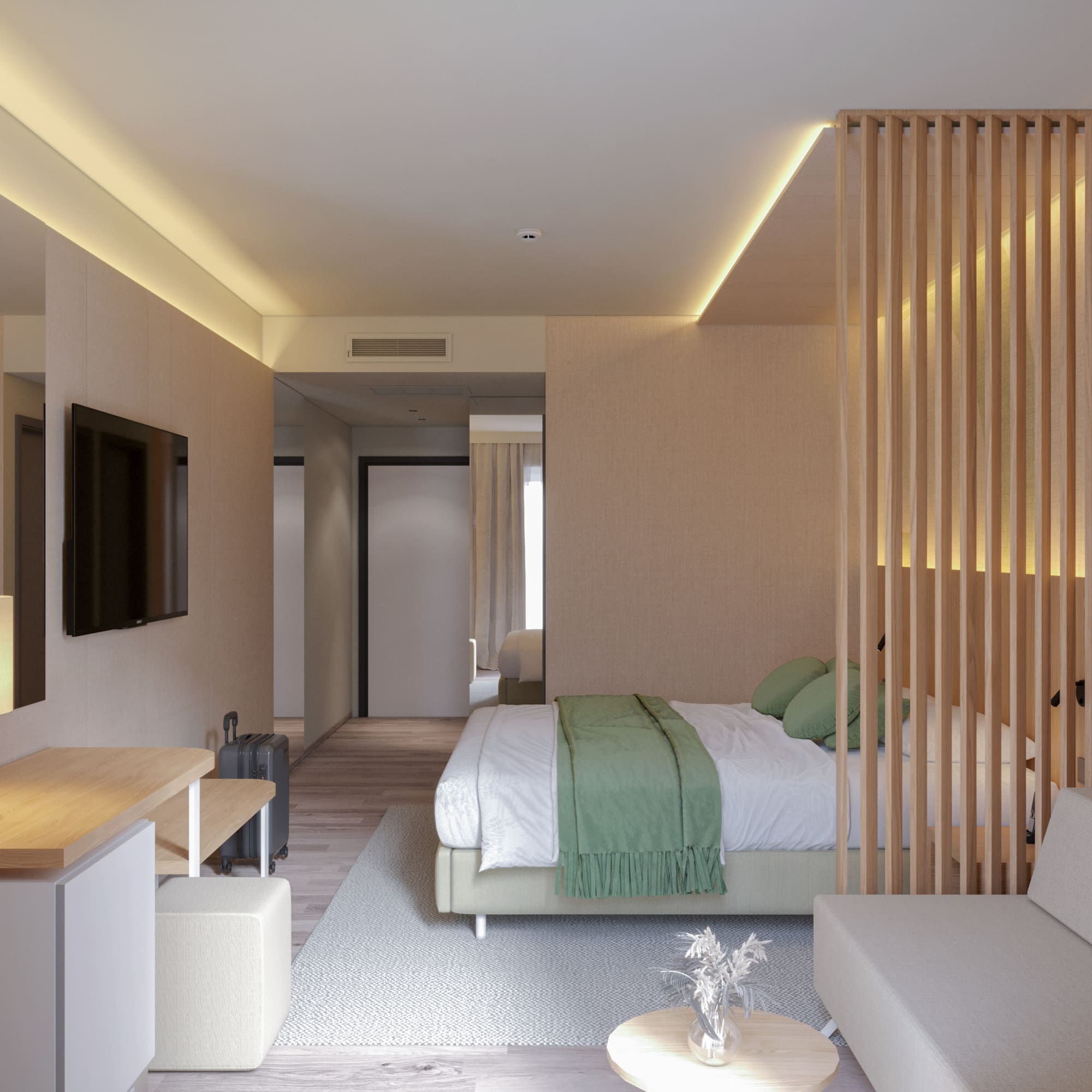 a room with a bed and a tv