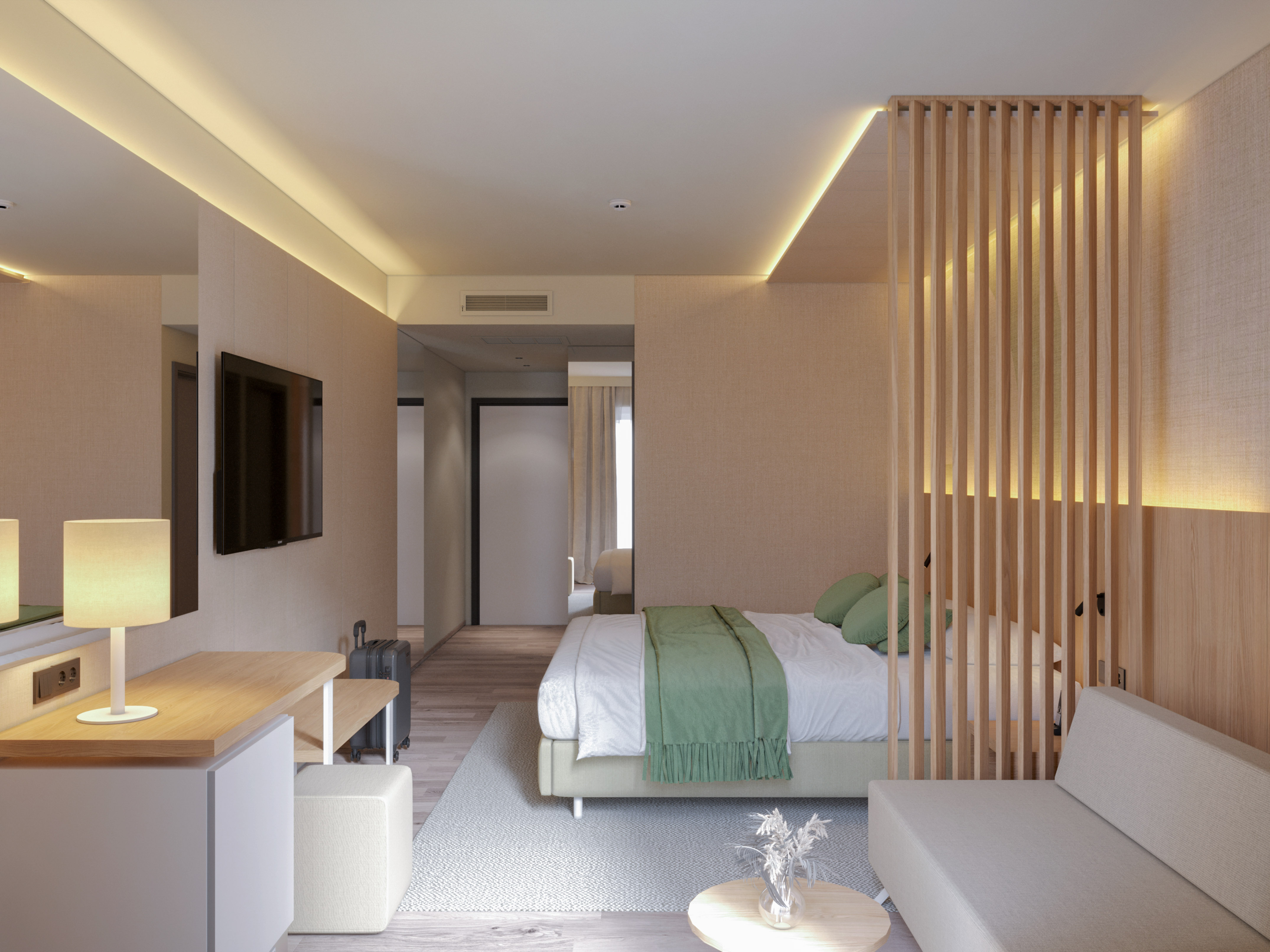 a room with a bed and a tv