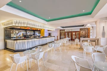 a room with tables and chairs