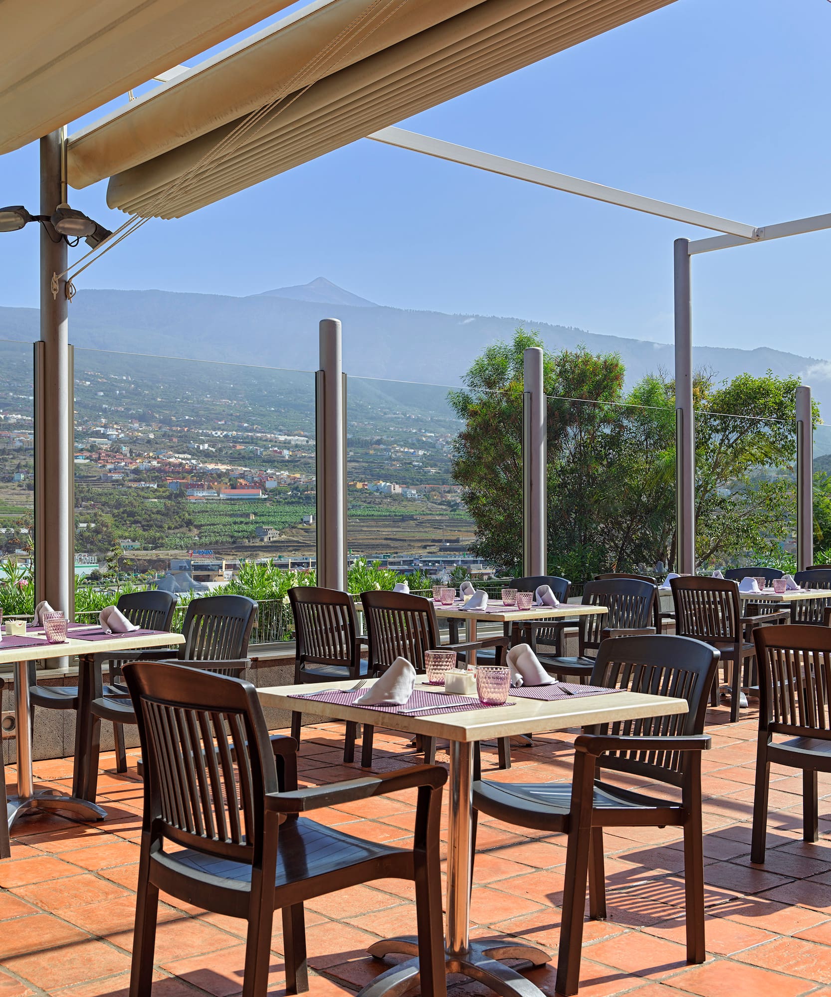 a restaurant with tables and chairs