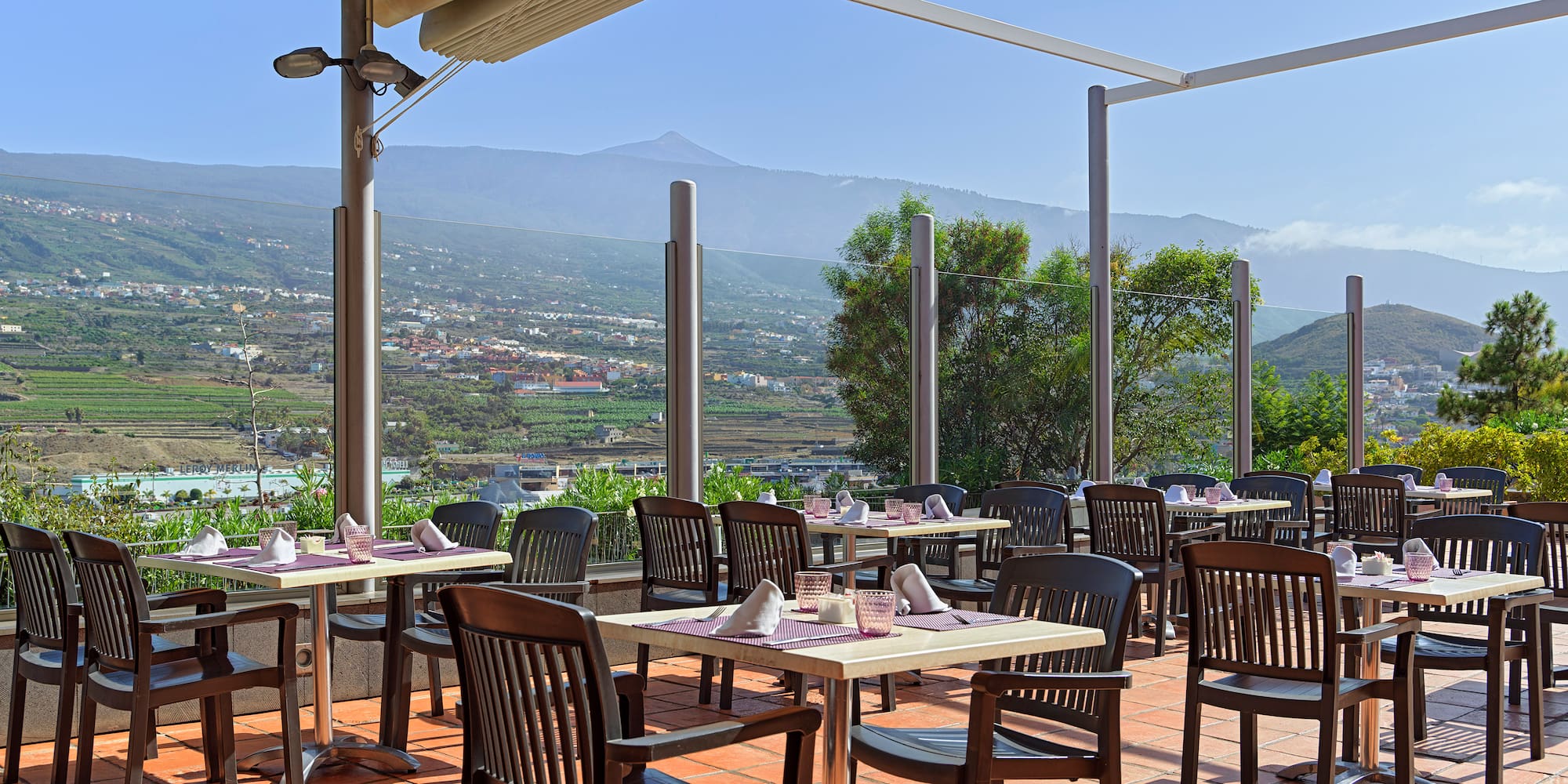 a restaurant with tables and chairs