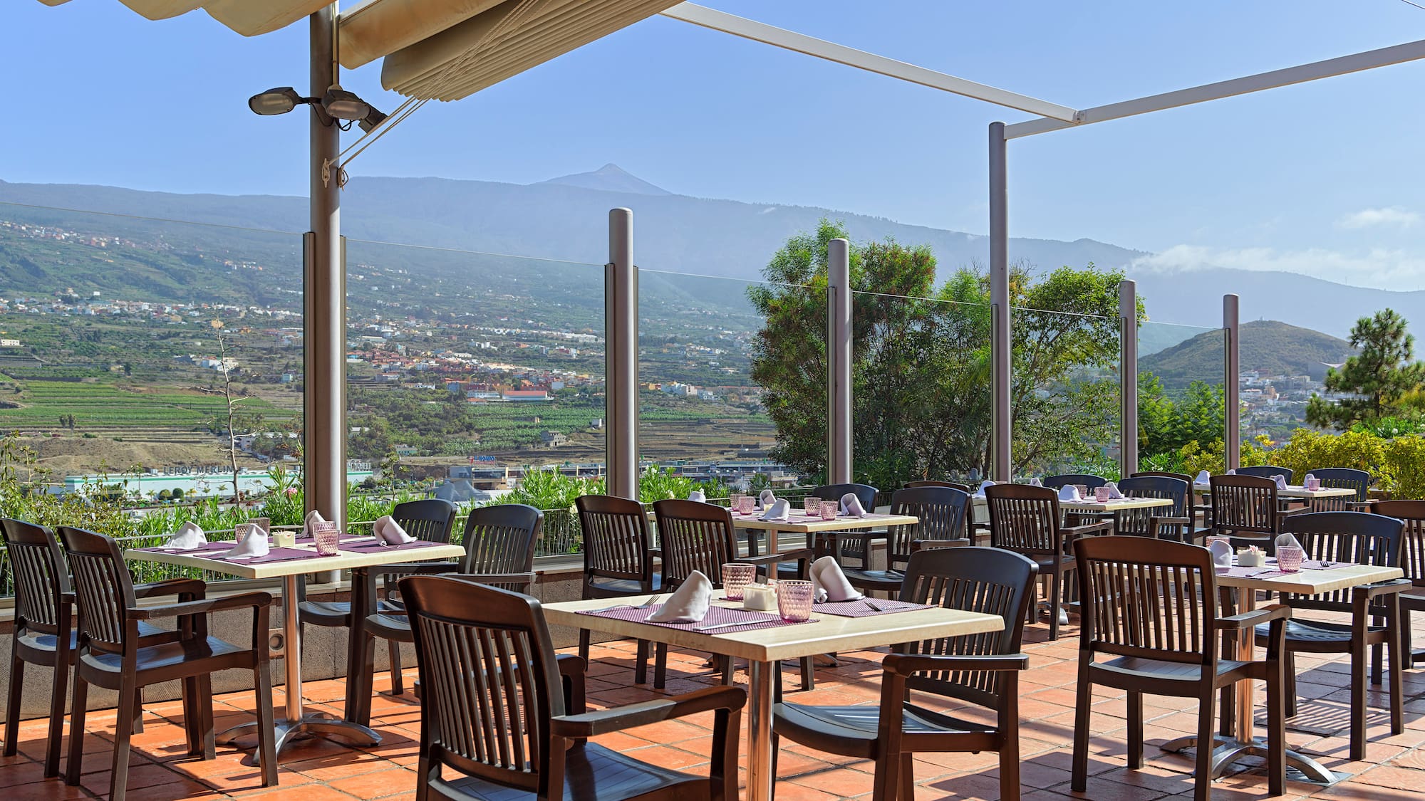 a restaurant with tables and chairs