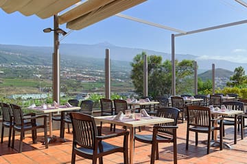 a restaurant with tables and chairs