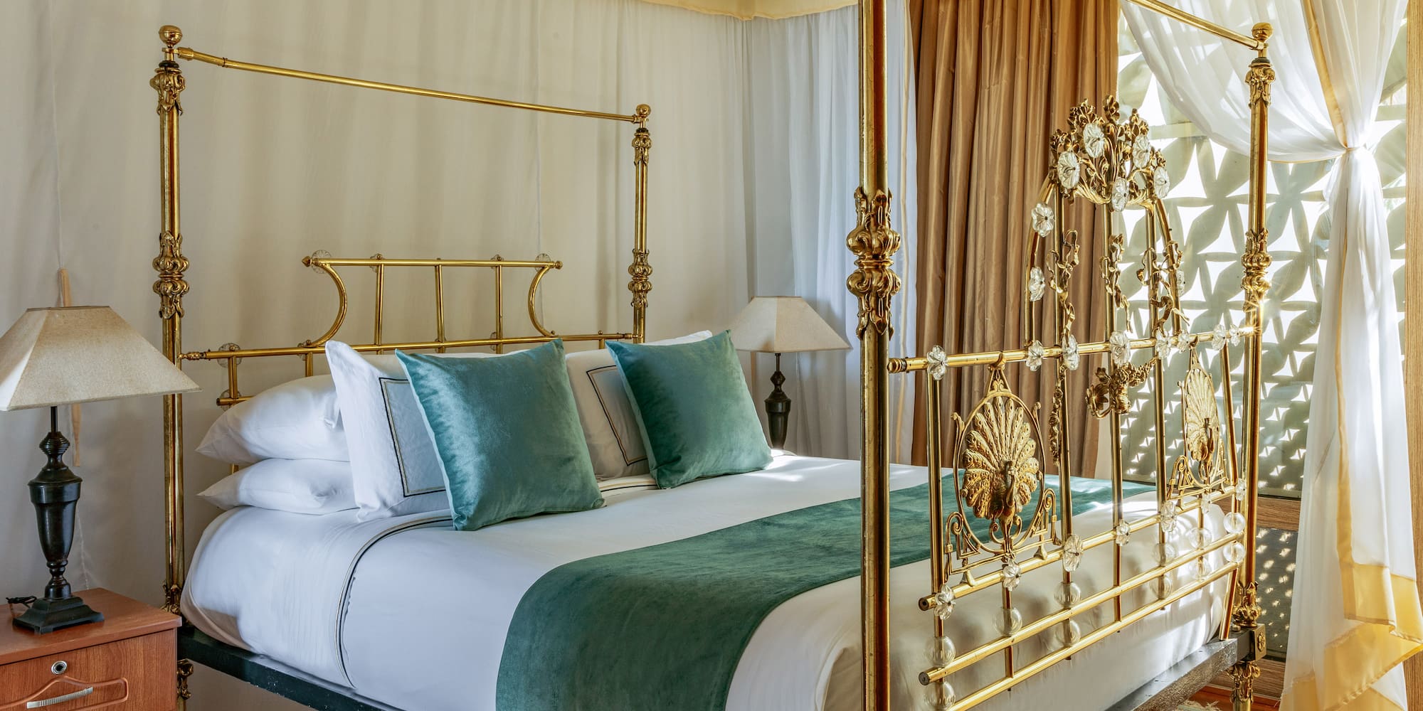 a bed with a gold frame