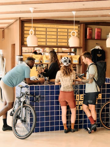 a group of people standing at a counter