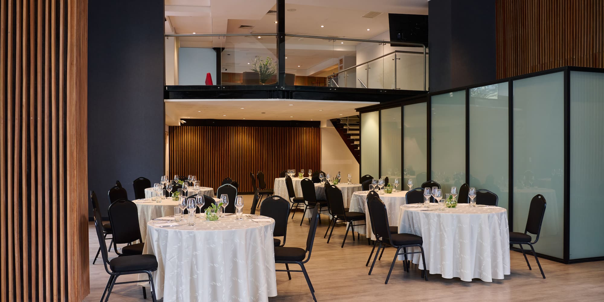 a room with tables and chairs