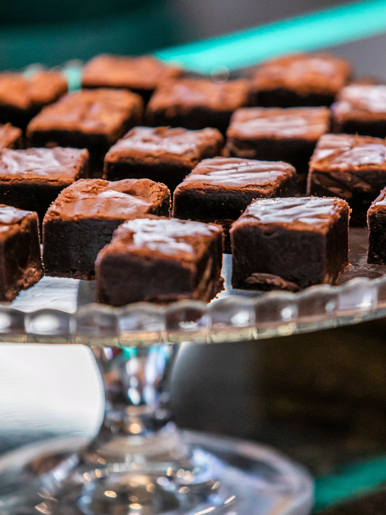 a plate of brownies on a table