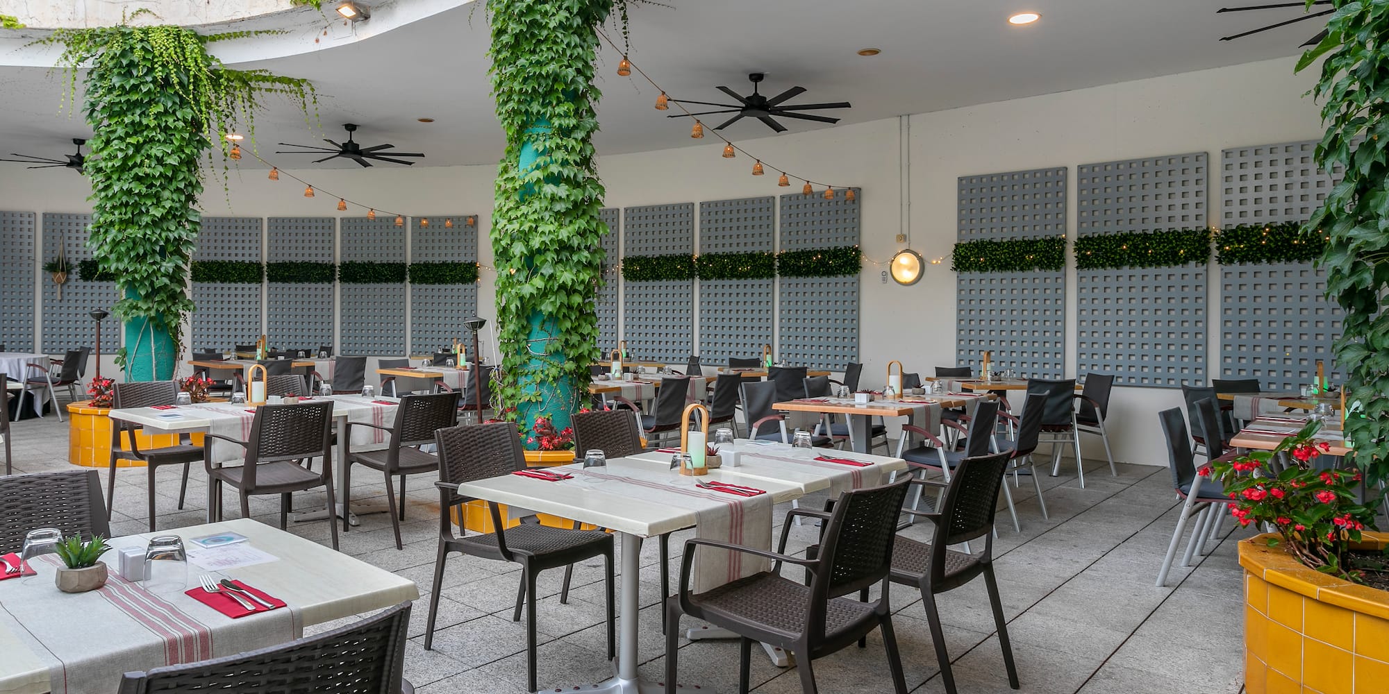 a restaurant with tables and chairs