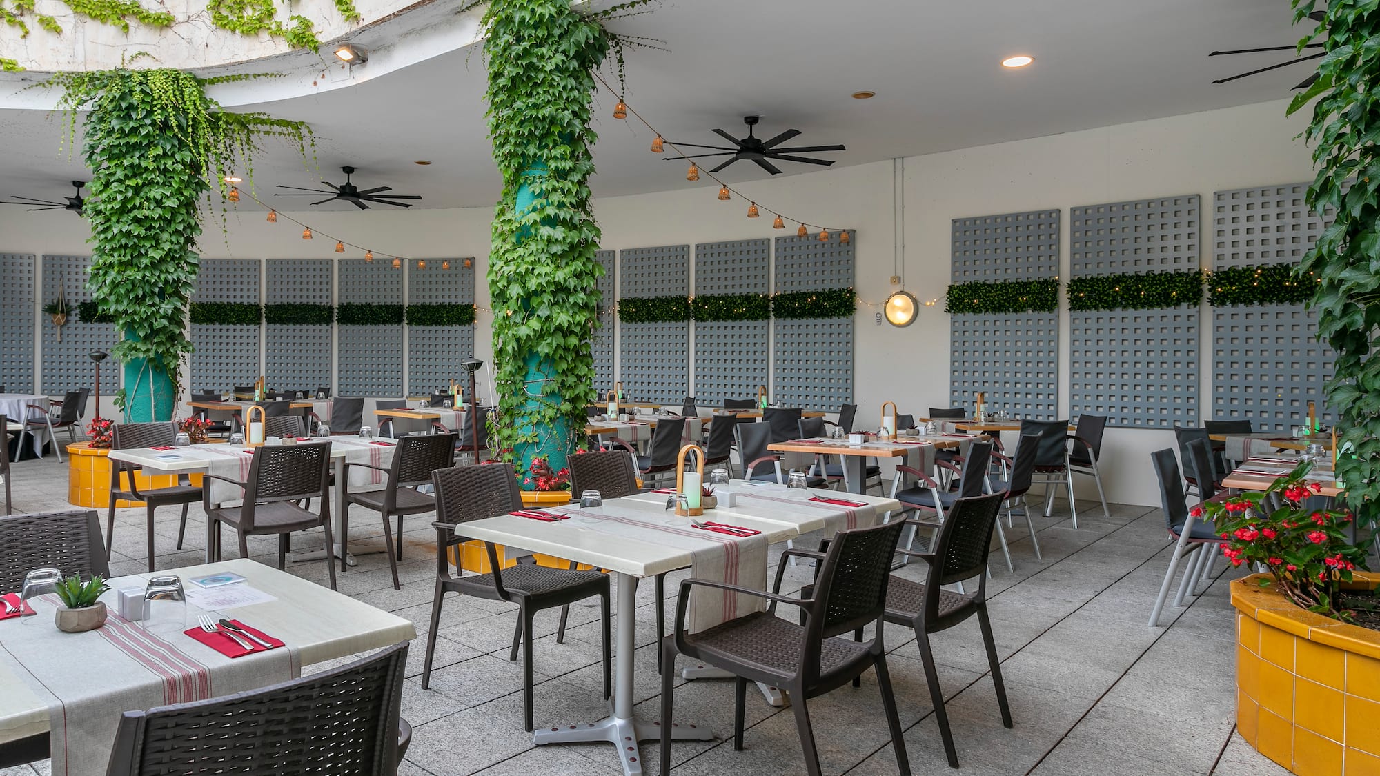 a restaurant with tables and chairs