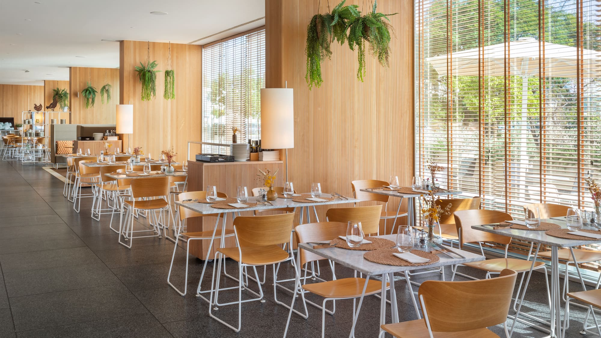 a room with tables and chairs