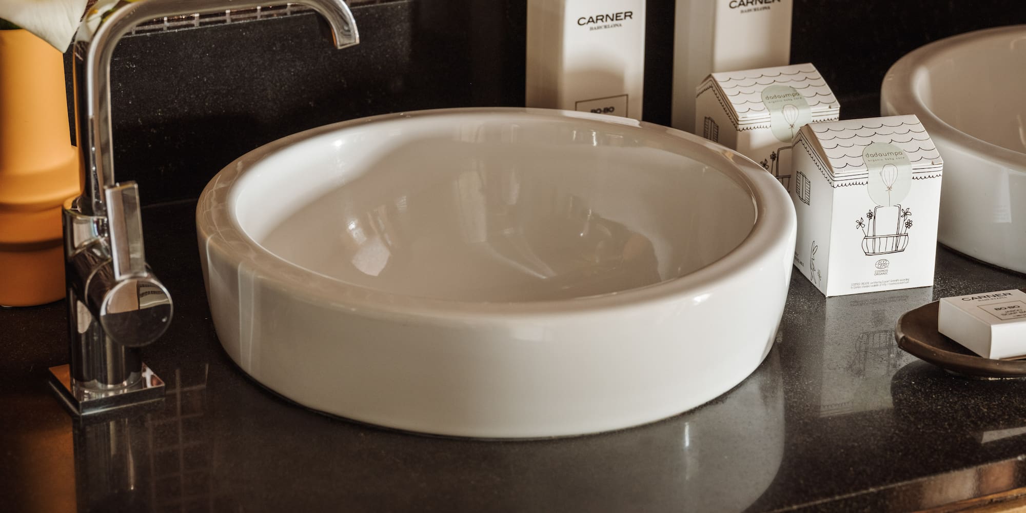 a sink and soap on a counter