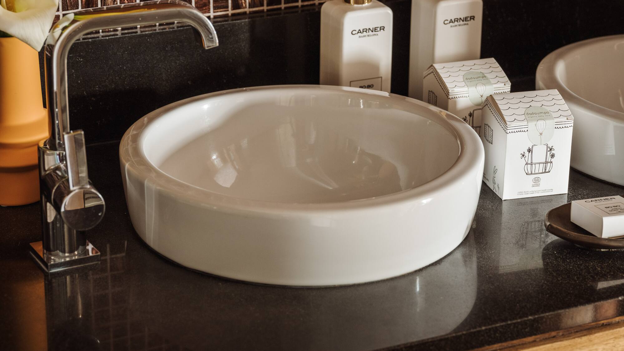 a sink and soap on a counter