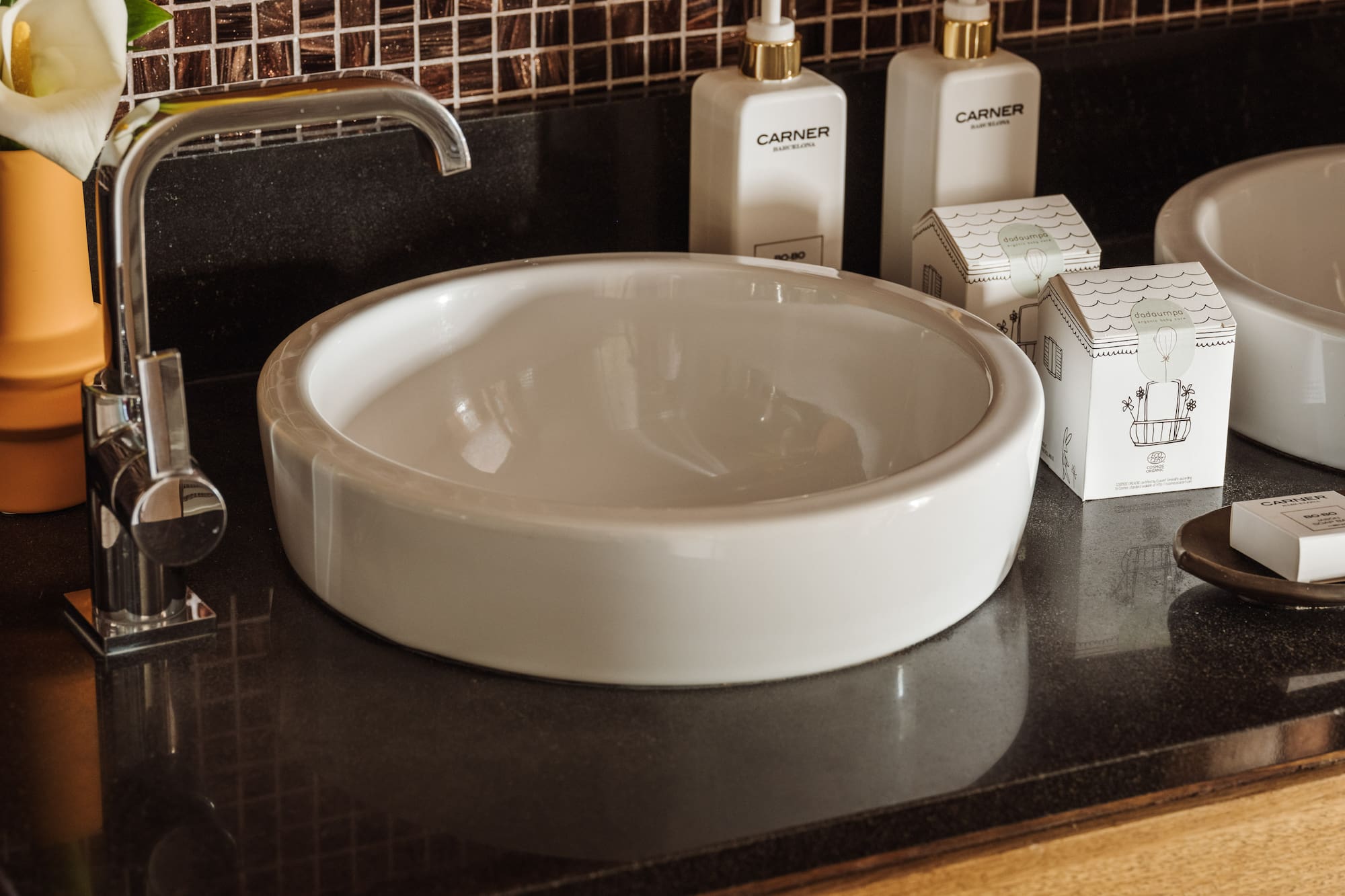a sink and soap on a counter