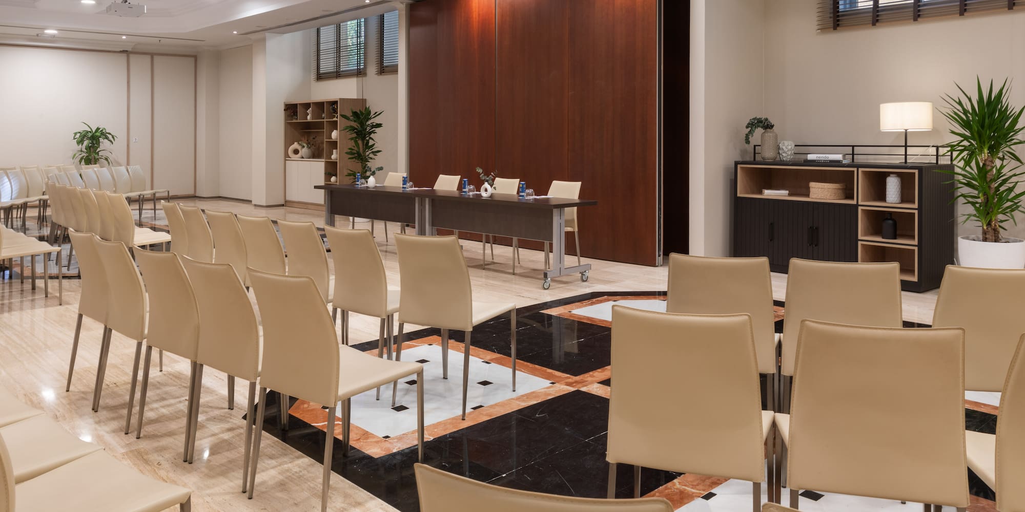 a room with chairs and a table