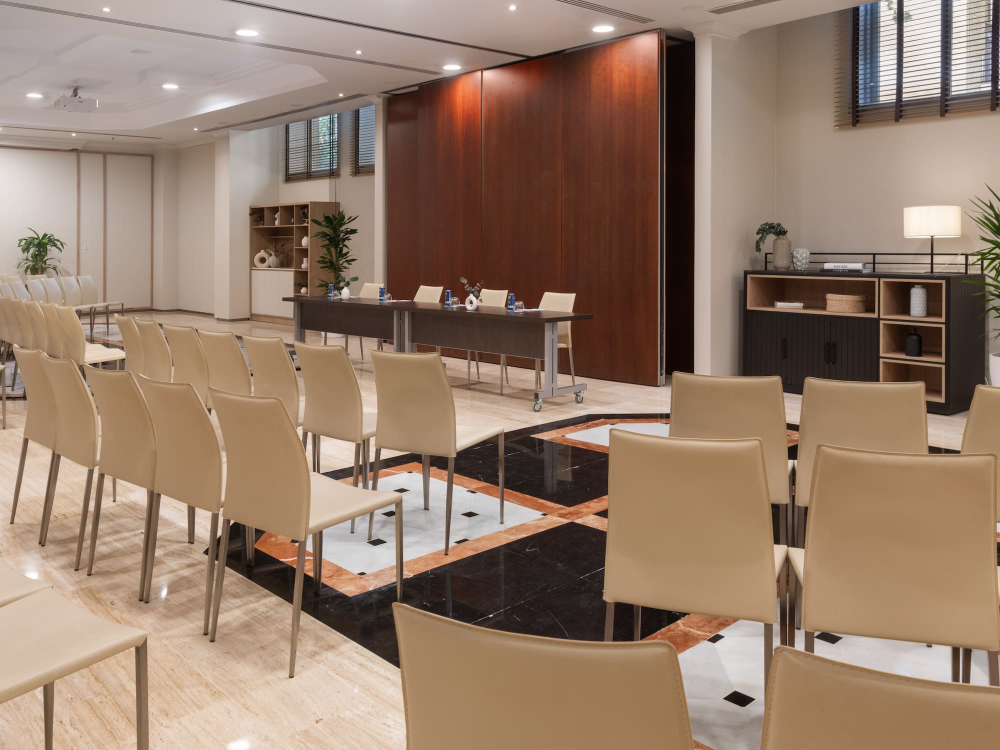 a room with chairs and a table