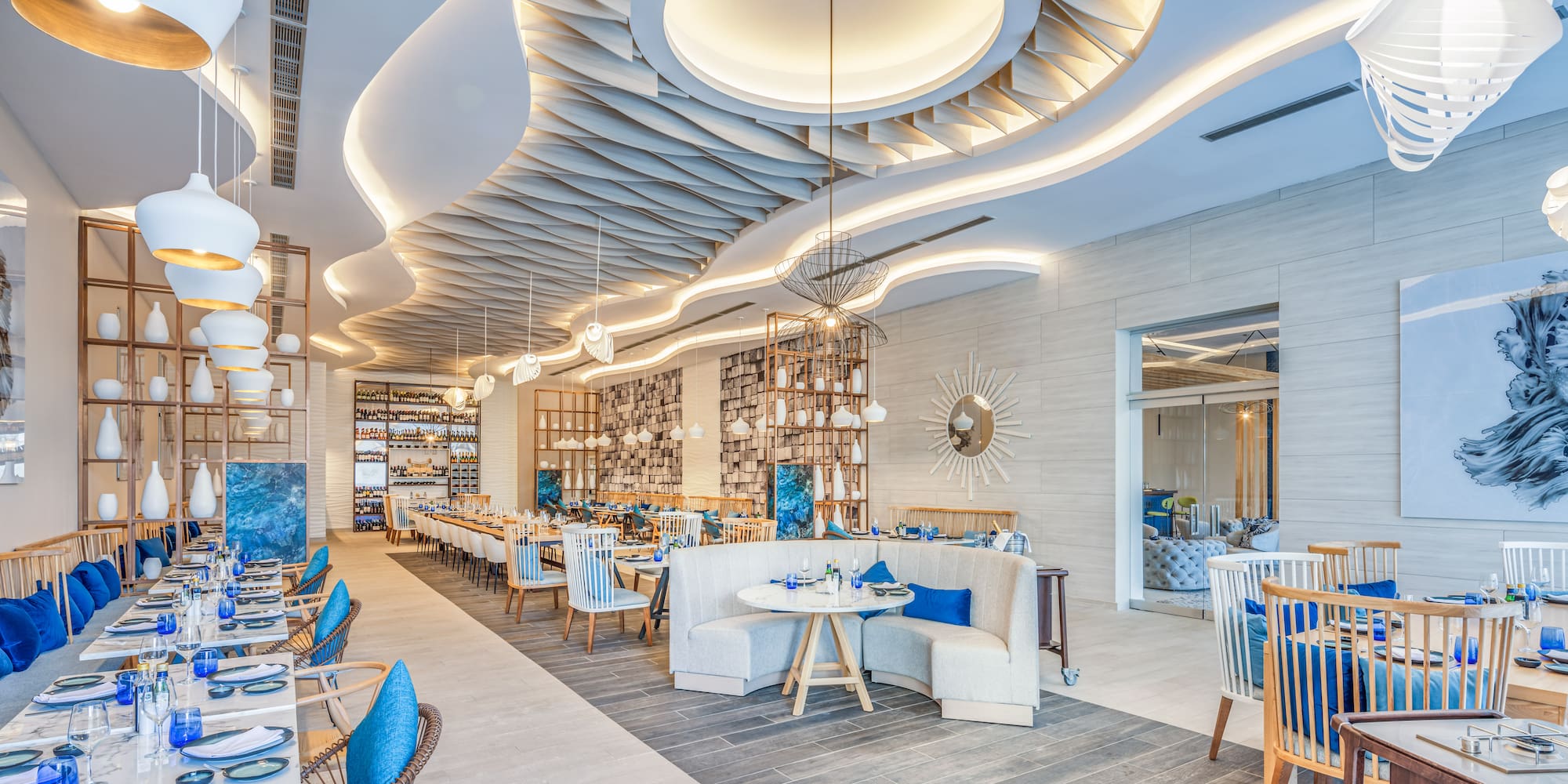 a restaurant with tables and chairs