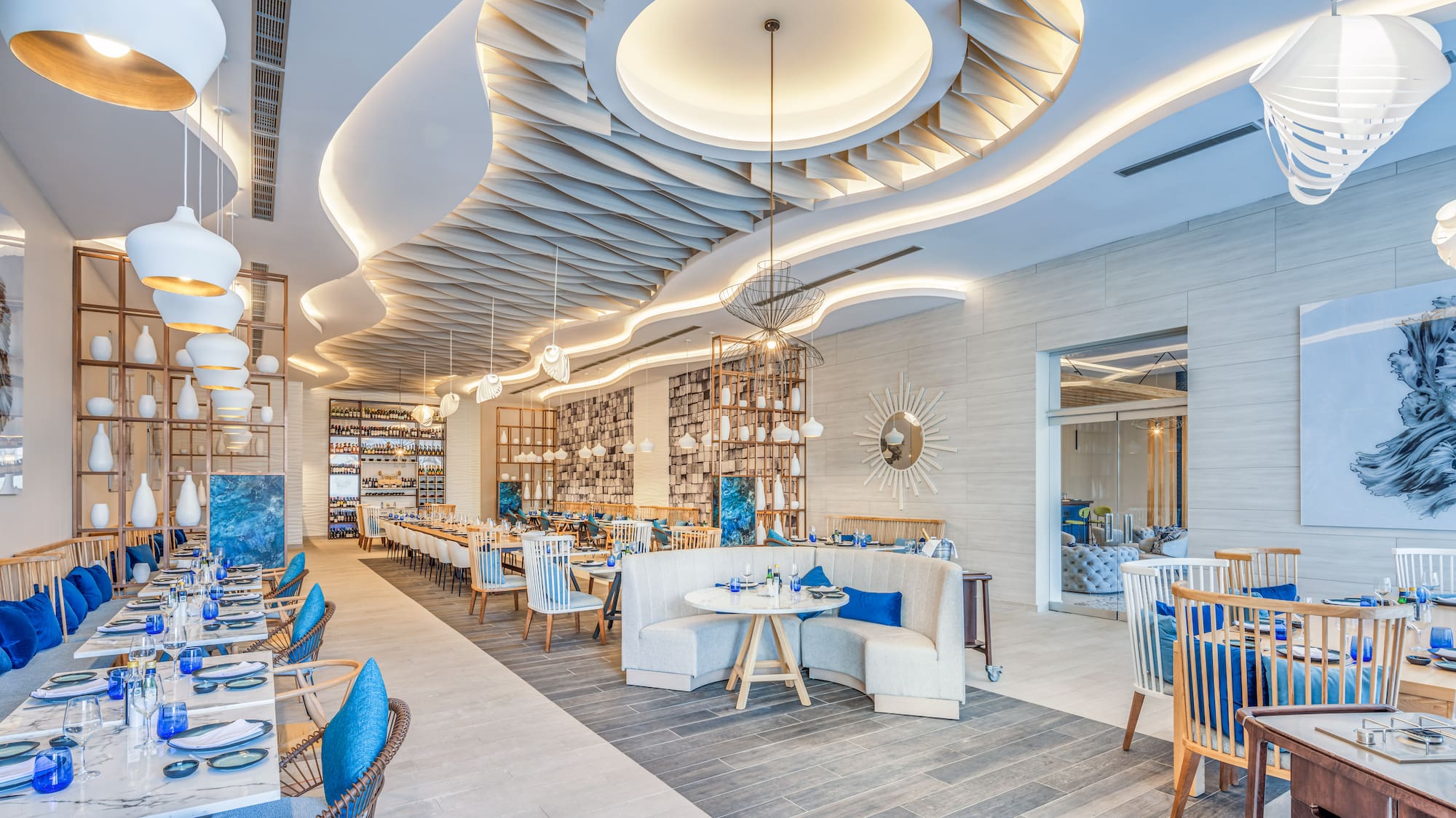 a restaurant with tables and chairs