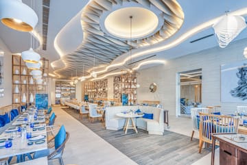 a restaurant with tables and chairs