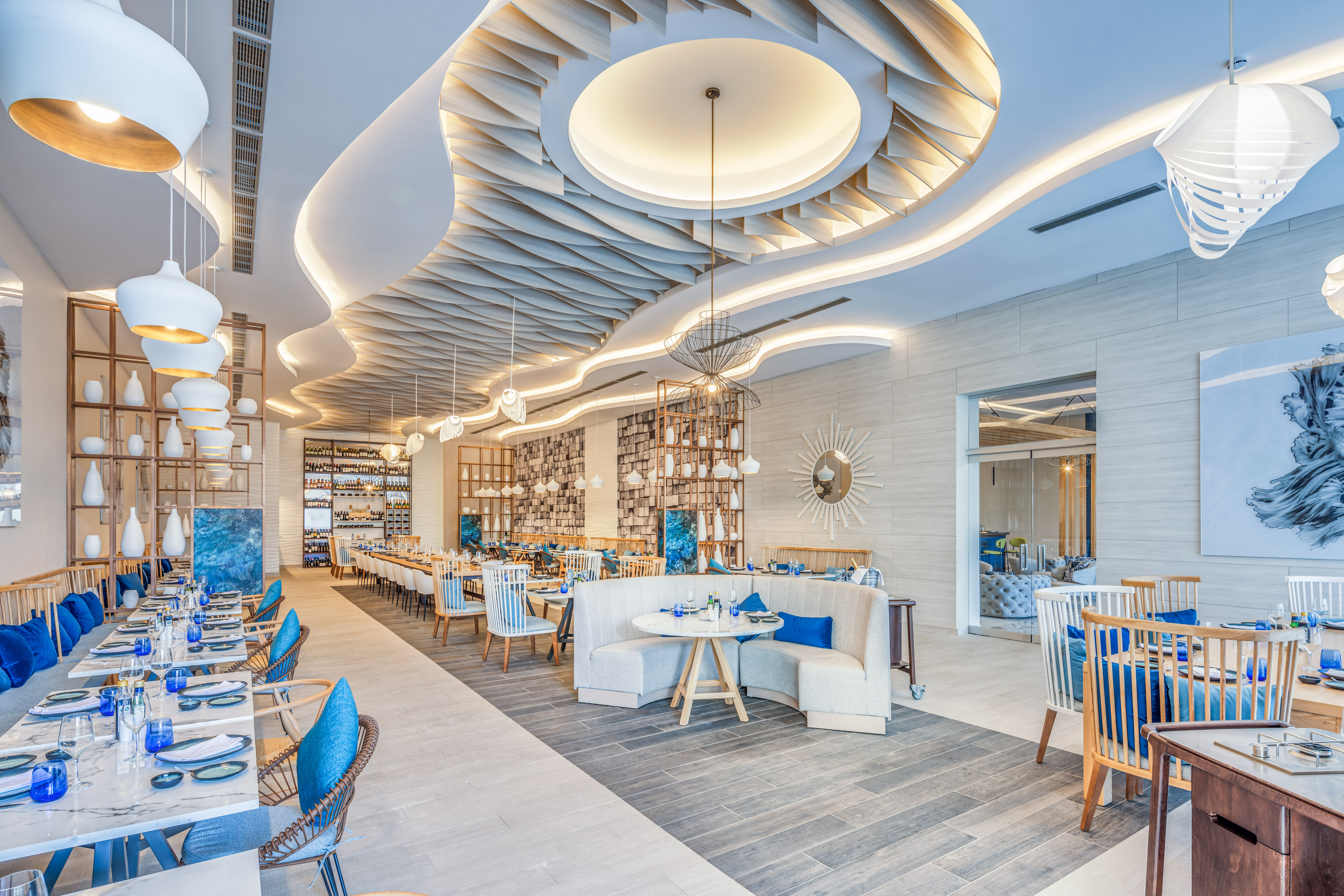 a restaurant with tables and chairs