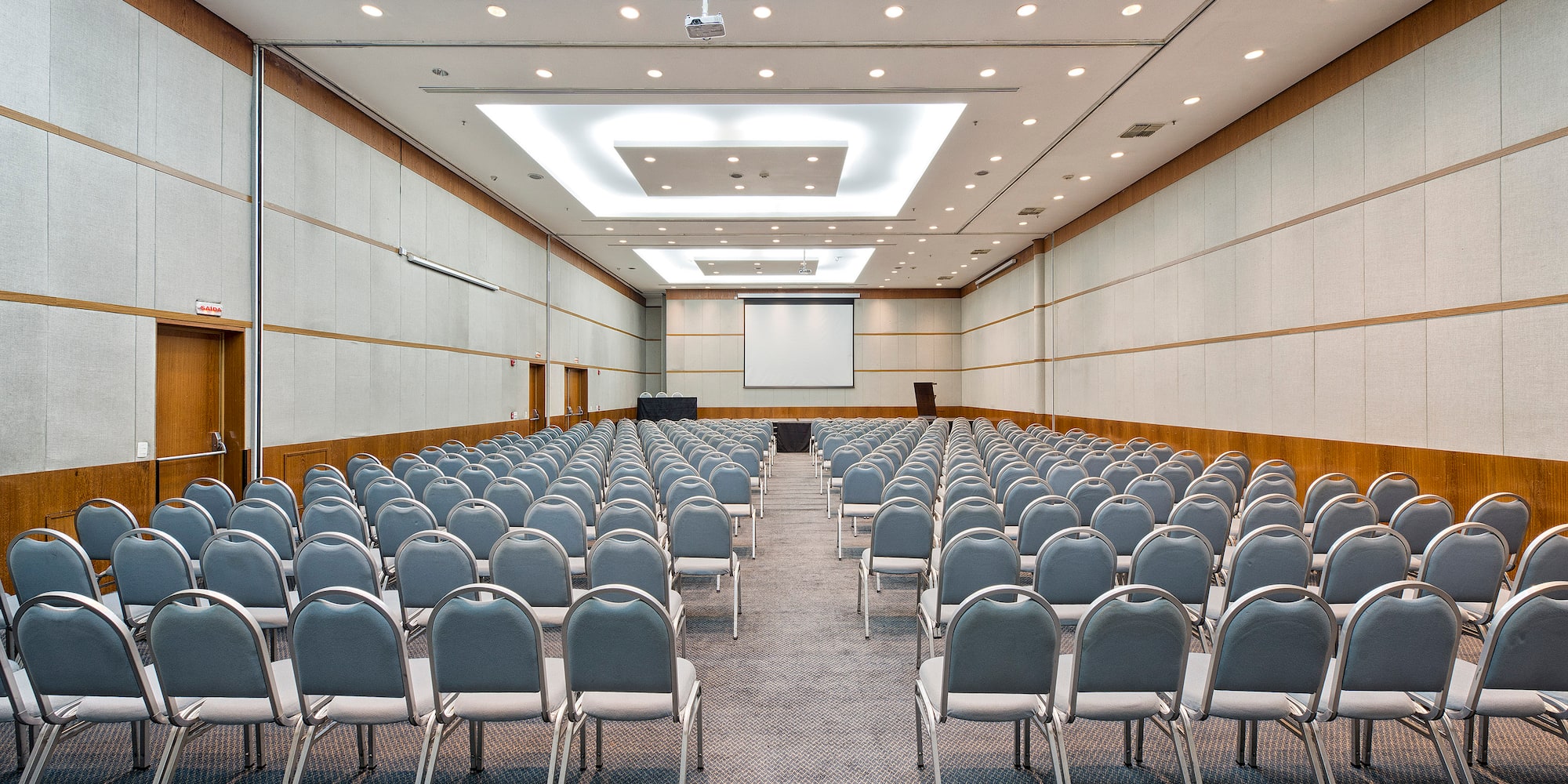 a room with rows of chairs