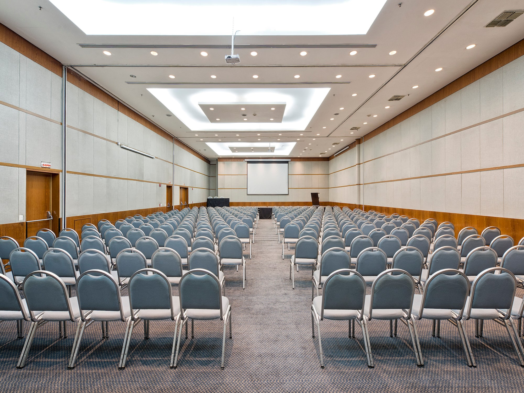 a room with rows of chairs