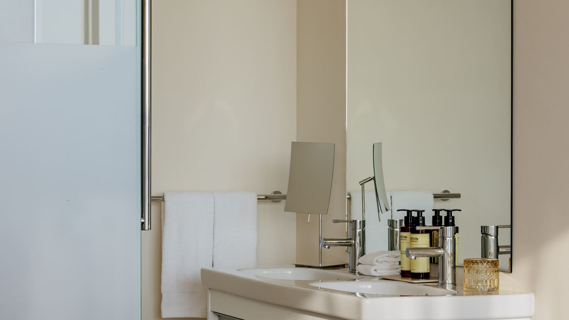 a bathroom with a mirror and sink