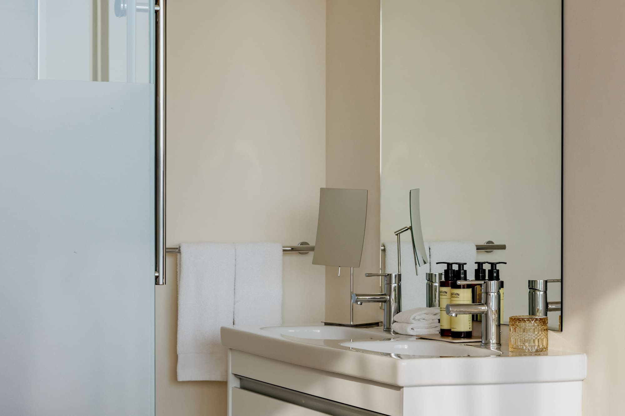 a bathroom with a mirror and sink