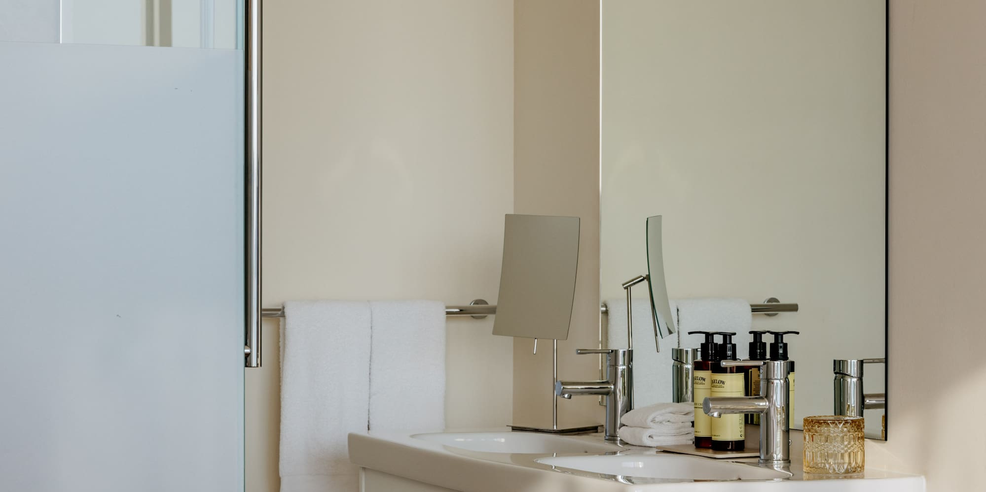 a bathroom with a mirror and sink