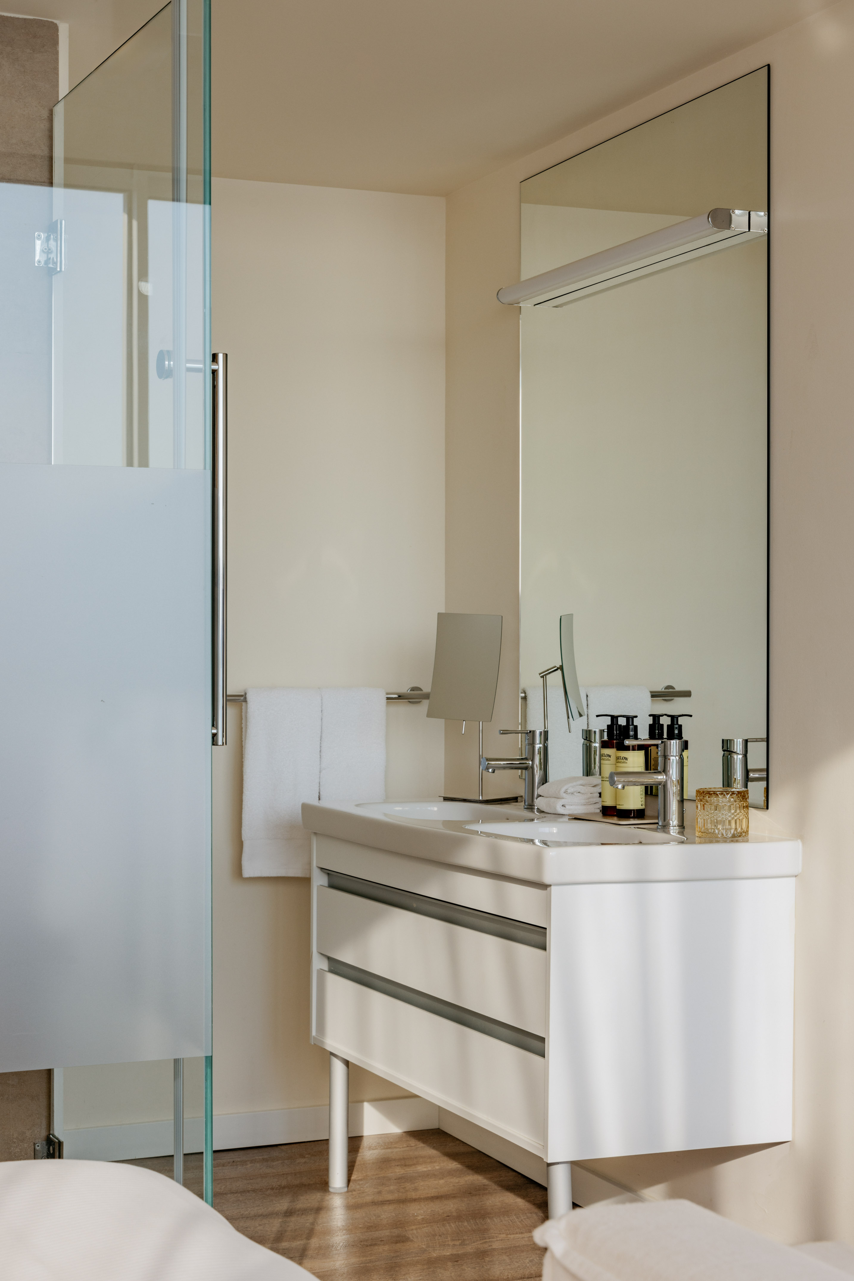 a bathroom with a mirror and sink